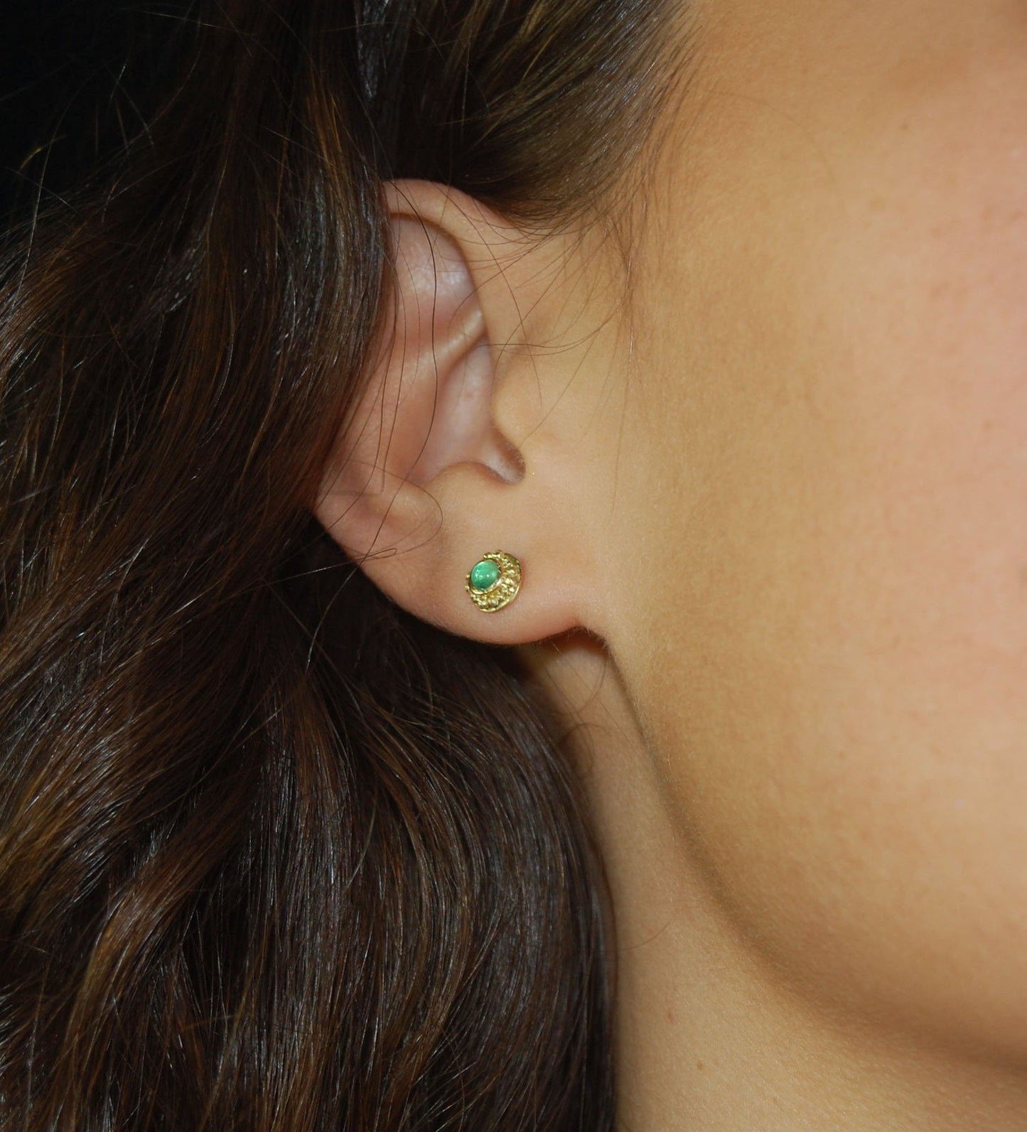 Emerald Cabochon 18k post earrings These stunning emerald cabochons are bezel-set in 18k gold with 18k granulation around the outside. These are 18k gold post earrings with a 14k gold ear nut. Classic and understated. But that color, though! Ya’ll know I