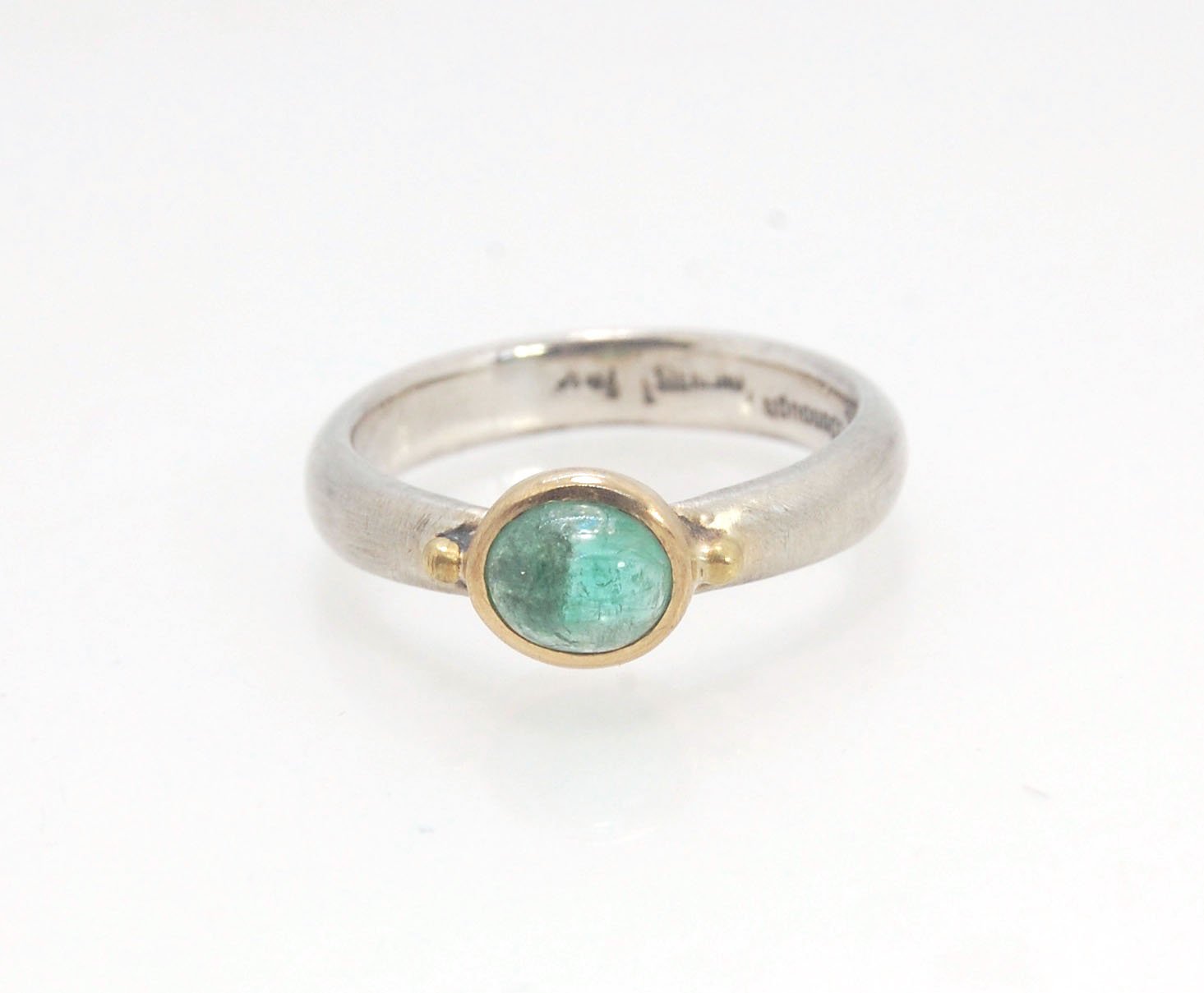 Emerald Bi Metal Freckle Ring - 14k and Sterling Silver - Size 8 This is a unique emerald cabochon with a darker freckle included in the lighter-colored emerald! This emerald cabochon is bezel-set in 14k gold with large gold granules on the Sterling Silve