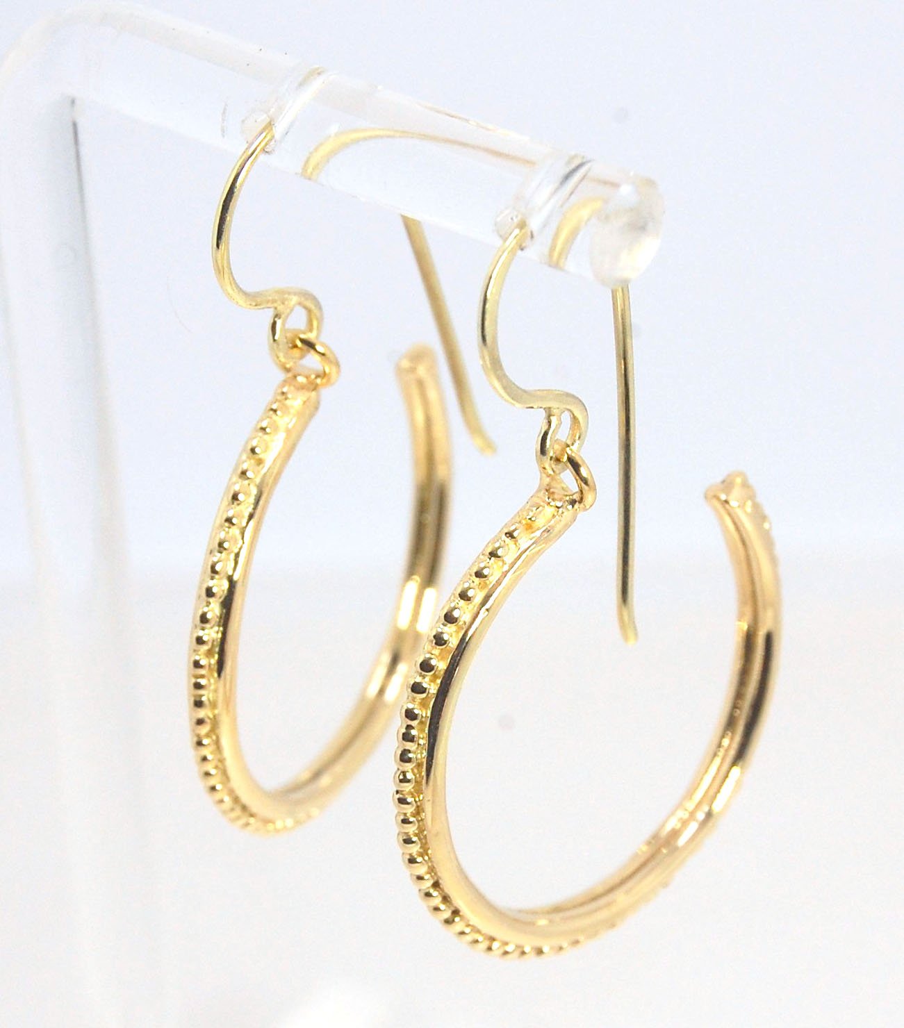 Etruscan hoop Dangles with French Hooks in 14k Gold - Large These 14k yellow gold hoops are cast in my studio from an original granulated master for a limited edition series of hoops. I use fine silver for the original granulation, then make a mold, pull