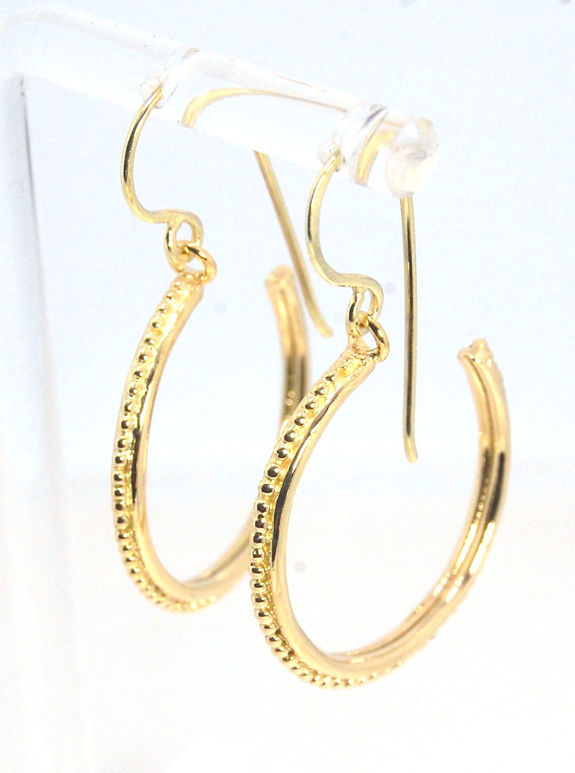 Etruscan hoop Dangles with French Hooks in 14k Gold - Large These 14k yellow gold hoops are cast in my studio from an original granulated master for a limited edition series of hoops. I use fine silver for the original granulation, then make a mold, pull