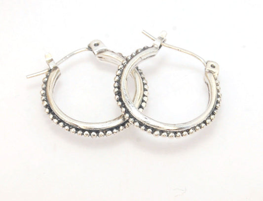 Etruscan hoops in Sterling Silver - Medium These sterling silver hoops are cast in my studio from a granulated master for a limited edition series of cast, granulated hoops. I use fine silver for the original granulation, then make a mold, pull a wax copy