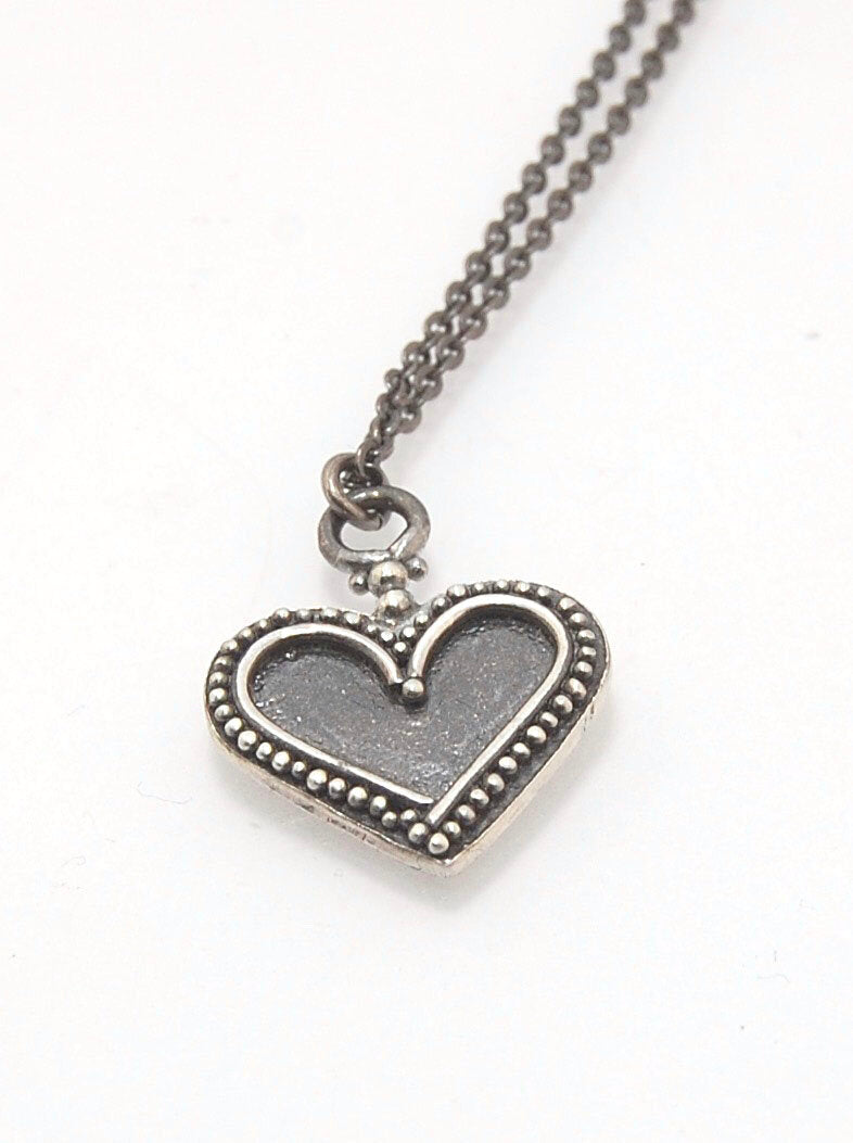 Wide Heart Cast Granulation Sterling Silver Pendant It’s a HEART! This classic heart is is cast from a granulated original in my studio using the Lost Wax casting process.Granulation is a controlled fusing process that has been utilized for thousands of y