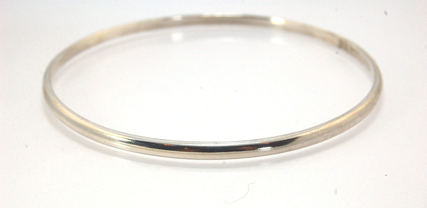 3mm Half Round Sterling Silver Bangles Who doesn’t love a good bangle stack! These bangles are available in 2 finishes. Shiny or Matte.Handmade by me in my studio, I pour a large ingot of sterling silver and roll it out into a half round shape and cut to