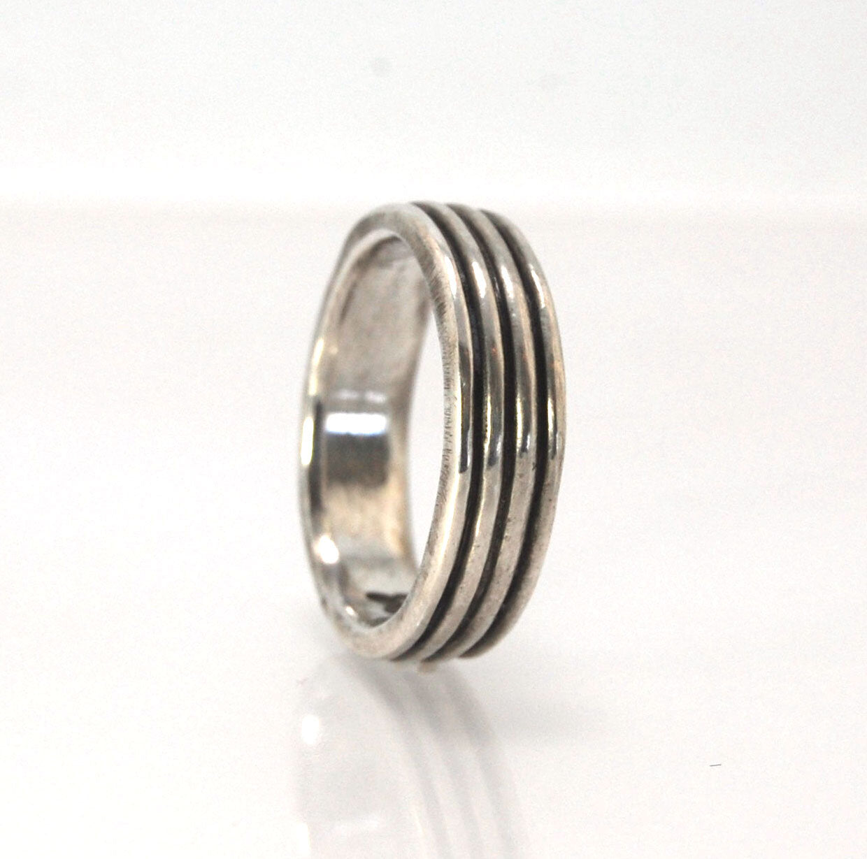 4 Rim Heavy Band 6mm wide - in Gold or Silver This is a heavy band cast from a wax carving turned on a lathe. These are so much fun to make! I have several different variations of this design.6mm wide and 2 mm thickThis ring is pictured in sterling silver