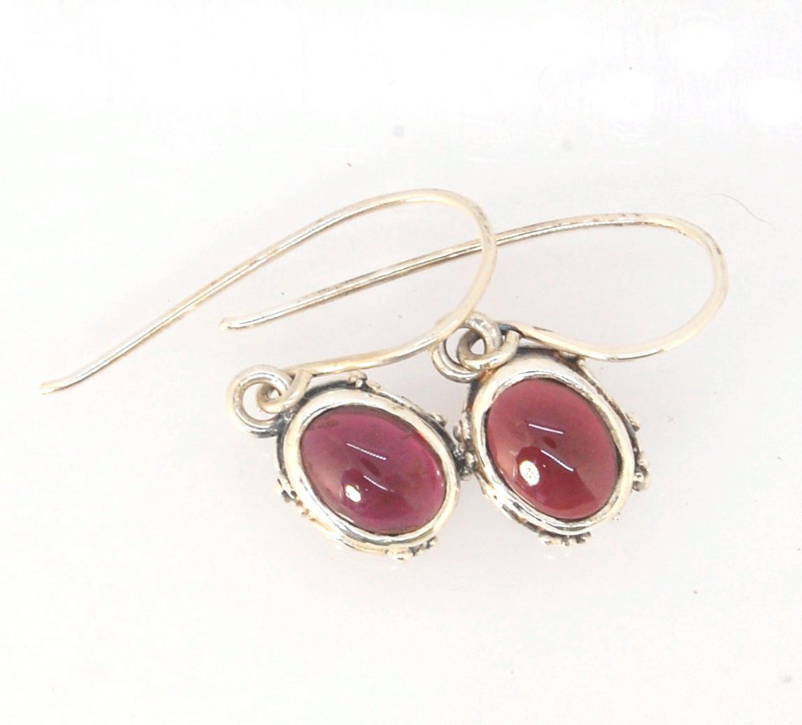 Oval Swirled Earrings with French Hooks in Sterling with your choice of Moonstone, Blue Chacedony, Amethyst, Rose Quartz, or Garnet These sweet swirled oval dangle earrings can be set with the stone of your choice: Moonstone, Blue Chacedony, Amethyst, Ros