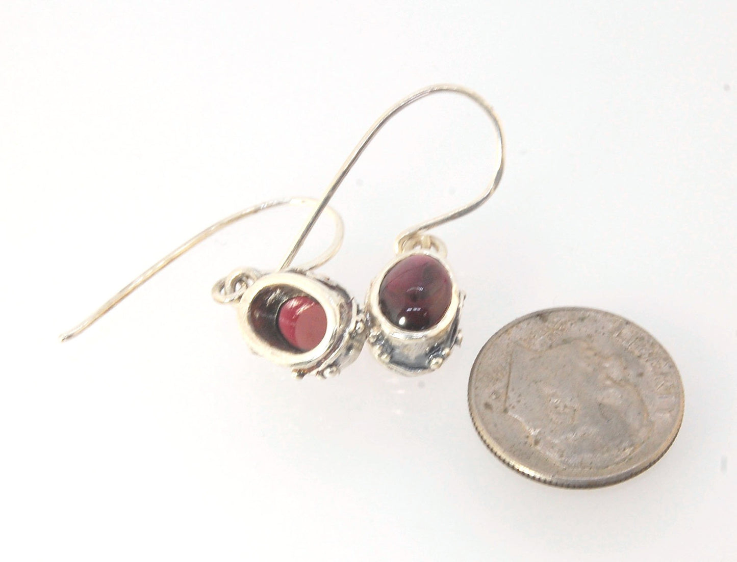 Oval Swirled Earrings with French Hooks in Sterling with your choice of Moonstone, Blue Chacedony, Amethyst, Rose Quartz, or Garnet These sweet swirled oval dangle earrings can be set with the stone of your choice: Moonstone, Blue Chacedony, Amethyst, Ros