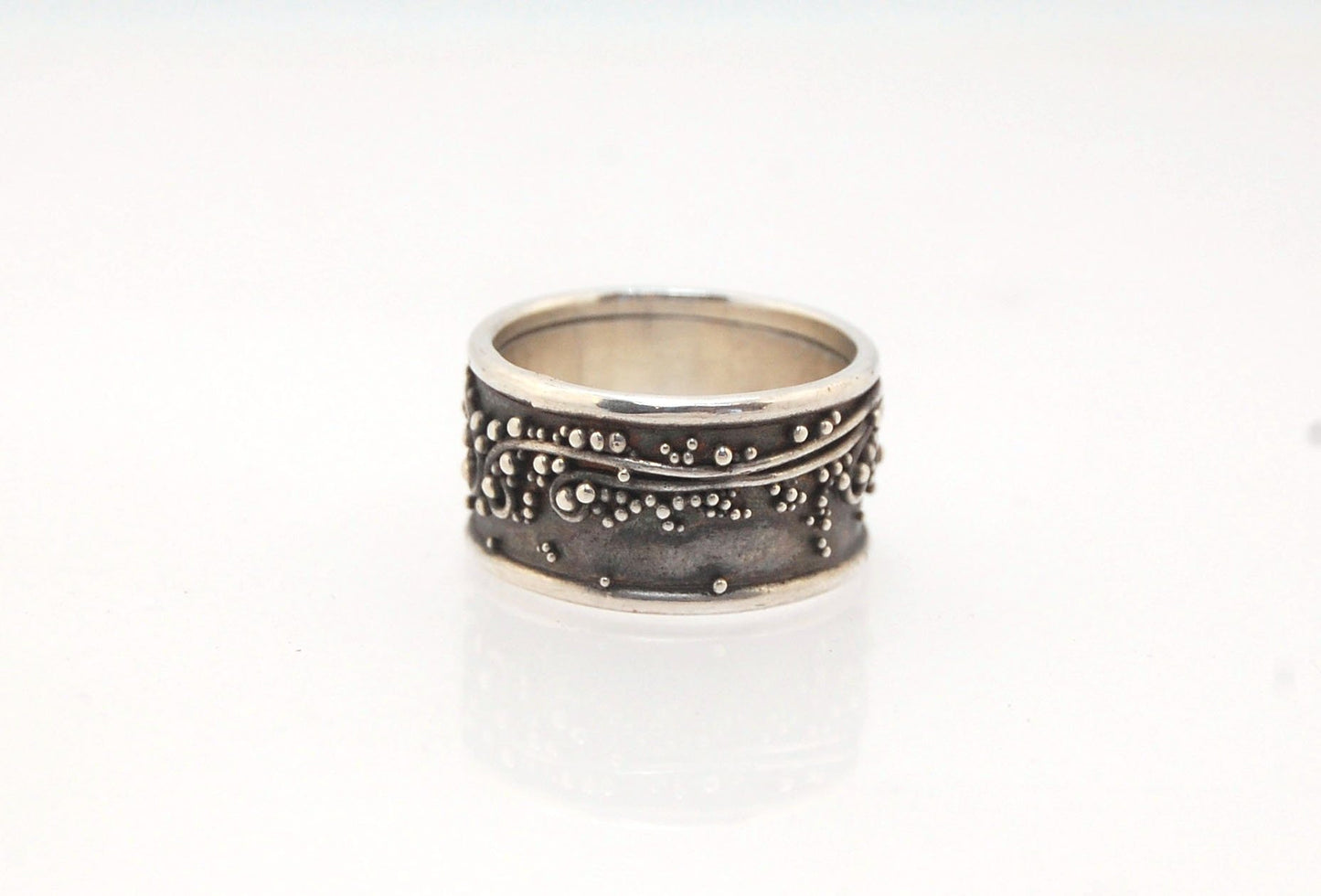 Waves Fine Silver Granulation Ring 11mm wide - PBS RING This is very similar to the ring I made during the segment of “A Craftsman’s Legacy” on PBS a few years ago. I am happy to make one for you in your size.Granulation is an ancient fusing process utili