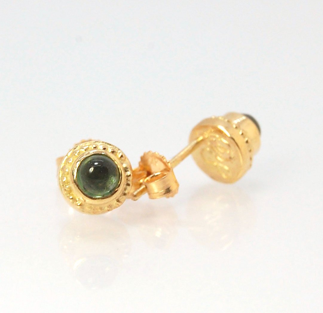 Green Tourmaline Classic Cast Granulation Studs in 14k These are tiny bezel settings I created using the ancient process of granulation. Then I made a mold of it and injected the mold with wax and used that wax to create a 14k gold version of these granul