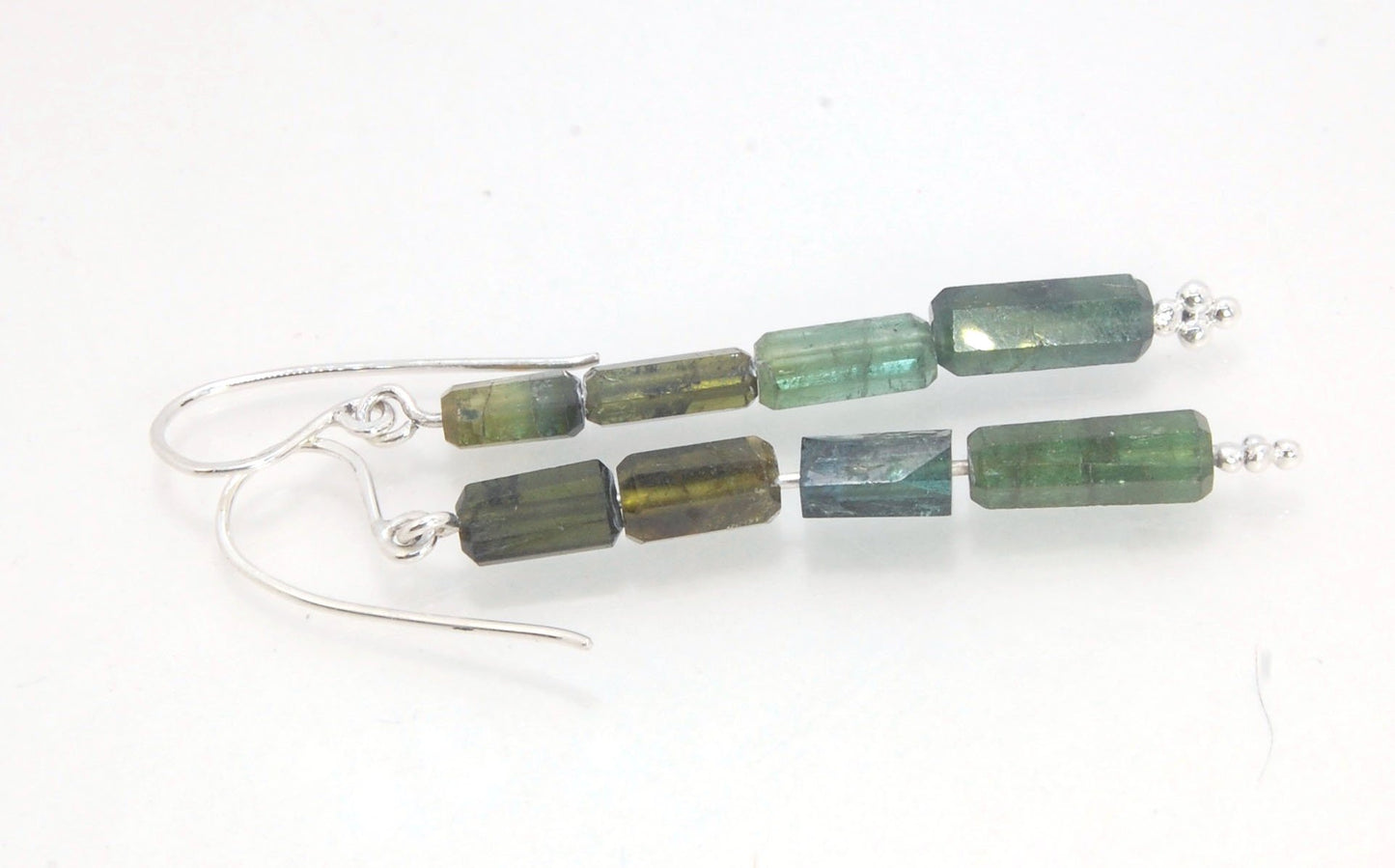 Green Blue Tourmaline Crystal Dangle Earrings in Silver Blue Green Tourmaline 5 Stone Crystal Dangles in Fine Silver and Sterling Silver gold with French hooks I just love blue-green tourmaline! These stones have a lovely, translucent blue-green color and