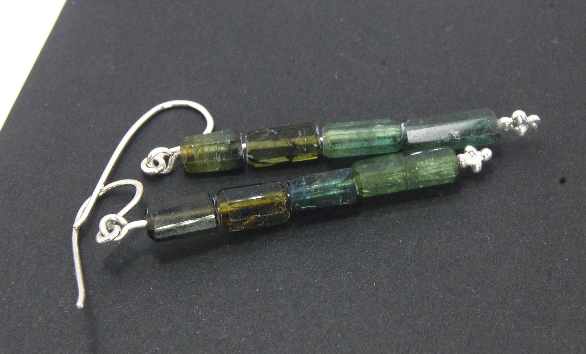 Green Blue Tourmaline Crystal Dangle Earrings in Silver Blue Green Tourmaline 5 Stone Crystal Dangles in Fine Silver and Sterling Silver gold with French hooks I just love blue-green tourmaline! These stones have a lovely, translucent blue-green color and