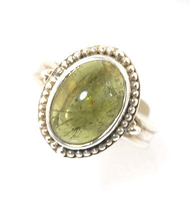 Green Tourmaline Fine Silver Granulation Ring- size 9 Granulation is a controlled fusing process that has been utilized for thousands of years. This unique surface will get more interesting with wear. The granules are individually placed and fused with a