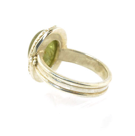 Green Tourmaline Fine Silver Granulation Ring- size 9 Granulation is a controlled fusing process that has been utilized for thousands of years. This unique surface will get more interesting with wear. The granules are individually placed and fused with a