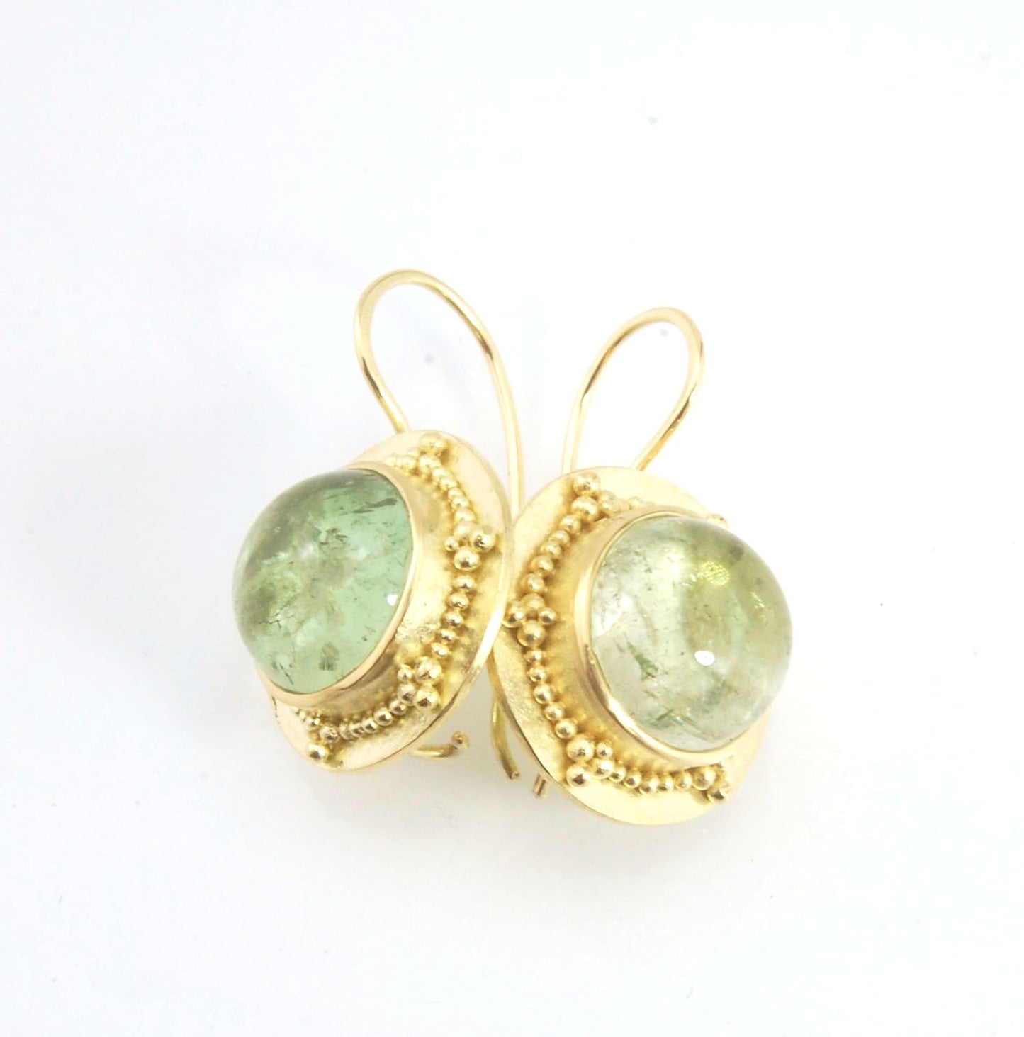 Green Bi-color Tourmaline 18k Gold Granulation Earrings These Green Bi-color Tourmaline 18k Gold Granulation Earrings are Classically-inspired 18k granulation. With 2 luminous and clear bi-color tourmaline cabochons bezel-set in 18k an accented ring of 18