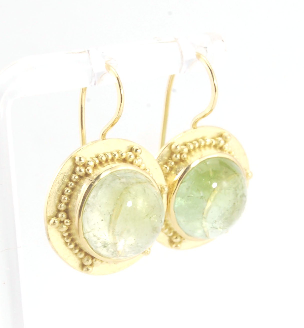 Green Bi-color Tourmaline 18k Gold Granulation Earrings These Green Bi-color Tourmaline 18k Gold Granulation Earrings are Classically-inspired 18k granulation. With 2 luminous and clear bi-color tourmaline cabochons bezel-set in 18k an accented ring of 18