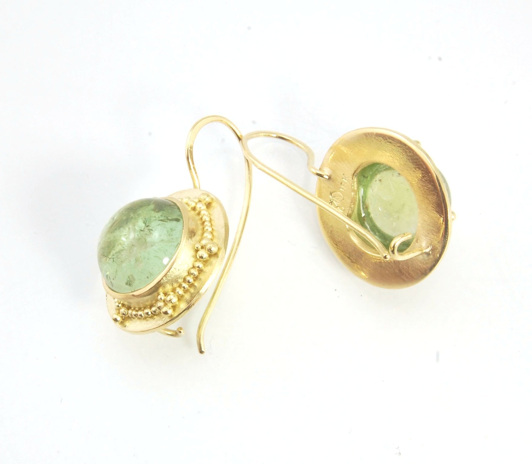 Green Bi-color Tourmaline 18k Gold Granulation Earrings These Green Bi-color Tourmaline 18k Gold Granulation Earrings are Classically-inspired 18k granulation. With 2 luminous and clear bi-color tourmaline cabochons bezel-set in 18k an accented ring of 18