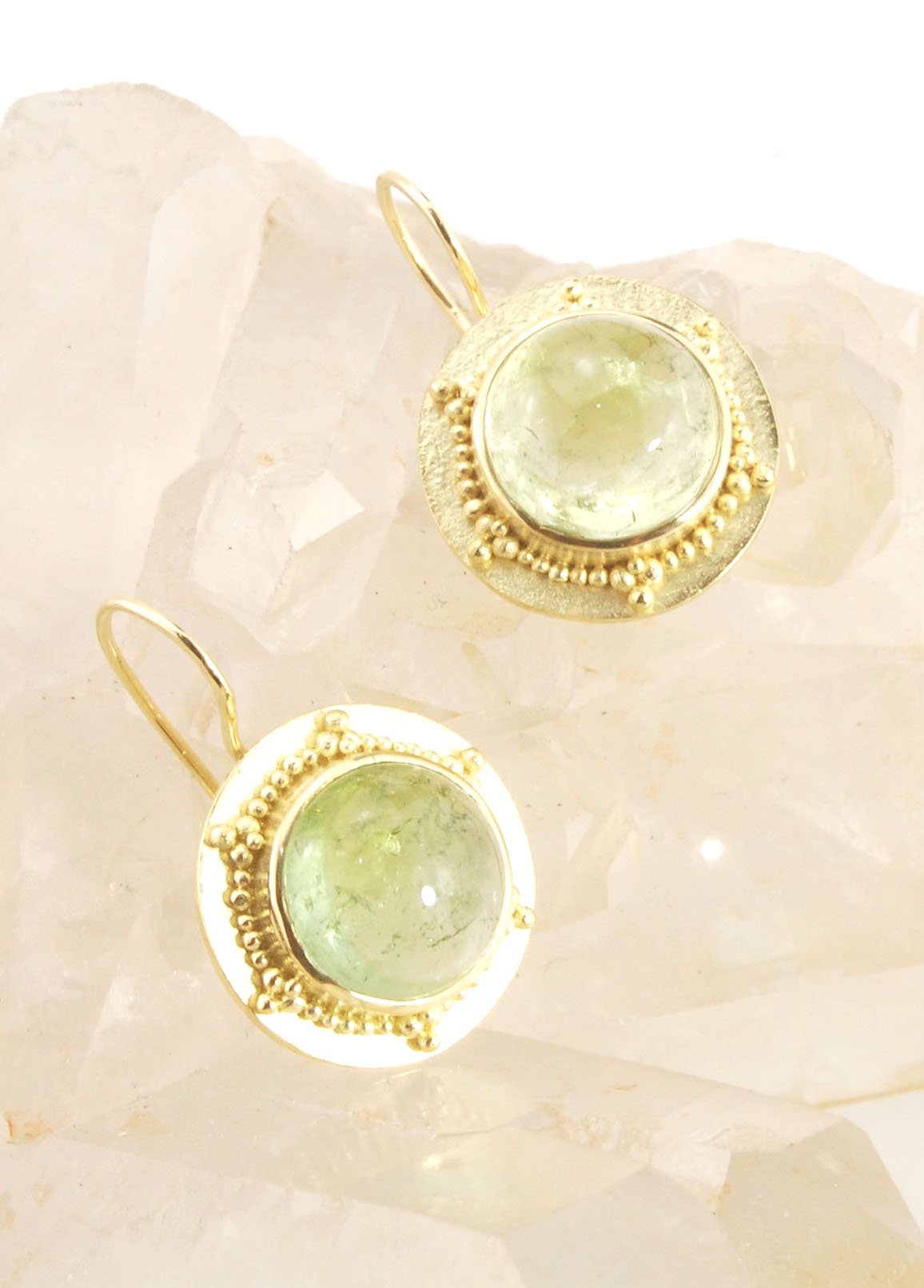 Green Bi-color Tourmaline 18k Gold Granulation Earrings These Green Bi-color Tourmaline 18k Gold Granulation Earrings are Classically-inspired 18k granulation. With 2 luminous and clear bi-color tourmaline cabochons bezel-set in 18k an accented ring of 18