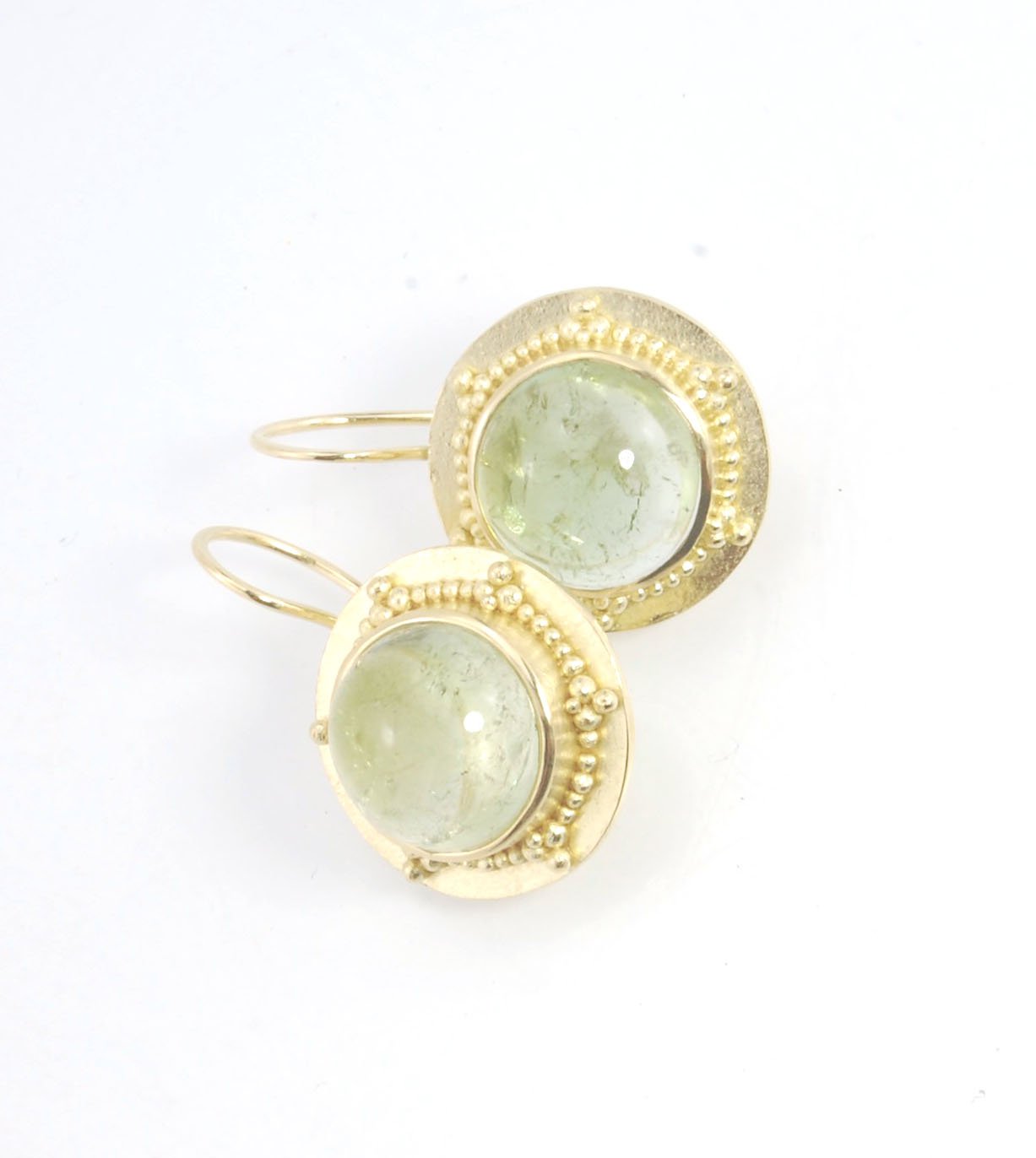 Green Bi-color Tourmaline 18k Gold Granulation Earrings These Green Bi-color Tourmaline 18k Gold Granulation Earrings are Classically-inspired 18k granulation. With 2 luminous and clear bi-color tourmaline cabochons bezel-set in 18k an accented ring of 18