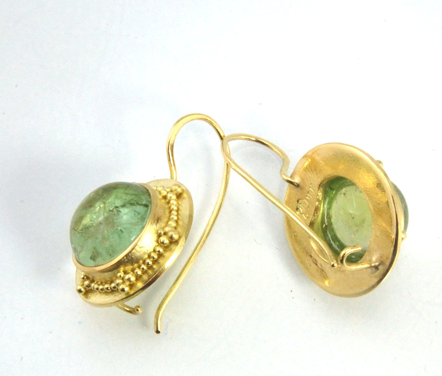 Green Bi-color Tourmaline 18k Gold Granulation Earrings These Green Bi-color Tourmaline 18k Gold Granulation Earrings are Classically-inspired 18k granulation. With 2 luminous and clear bi-color tourmaline cabochons bezel-set in 18k an accented ring of 18