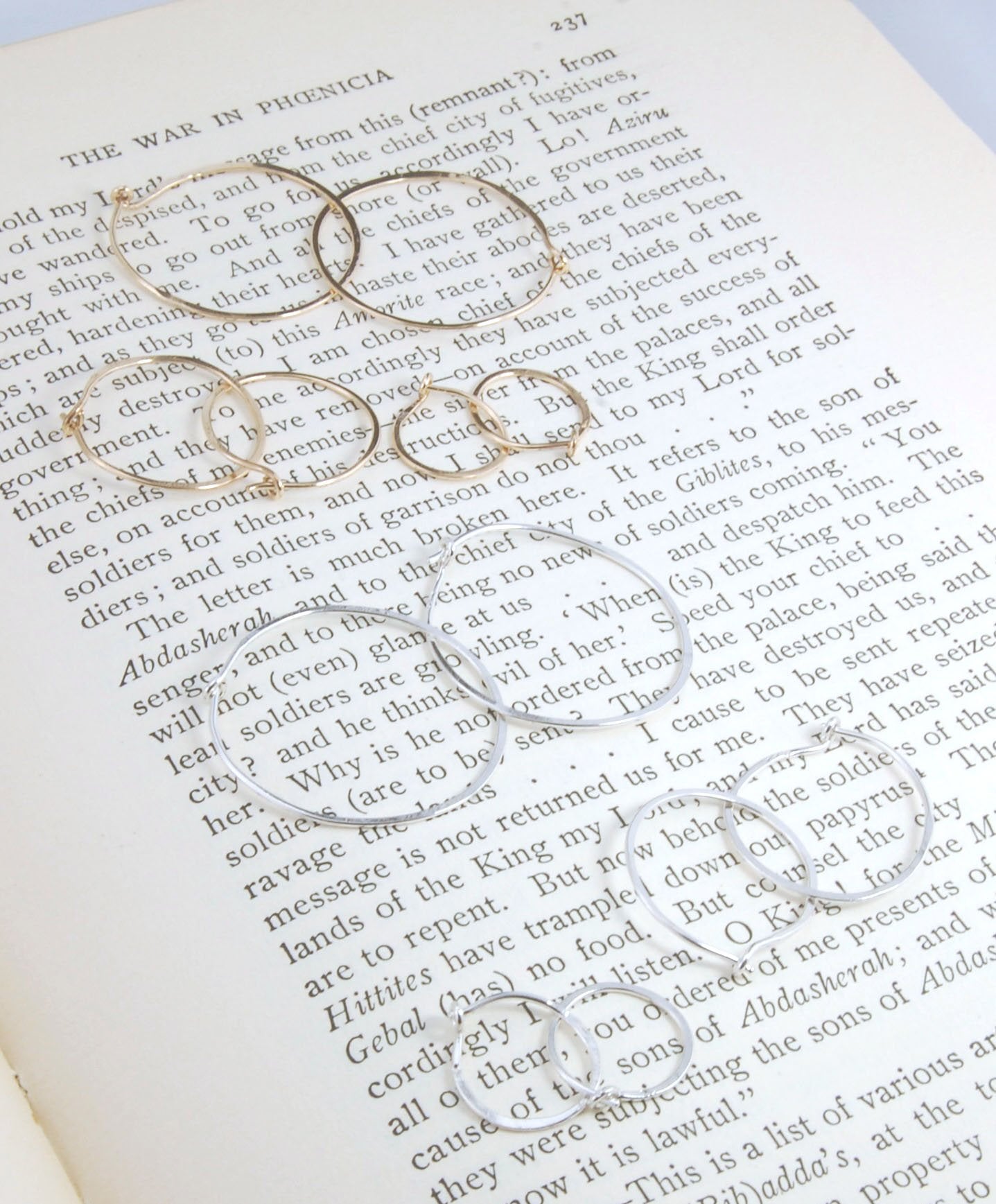 Hammered 14k Hoops - Small, Medium and Large These are exactly the same as my hammered sterling hoops, but they are made of solid 14k gold! They are super lightweight, classic wire hammered hoops you can sleep and live in. These delicate hoops are forged