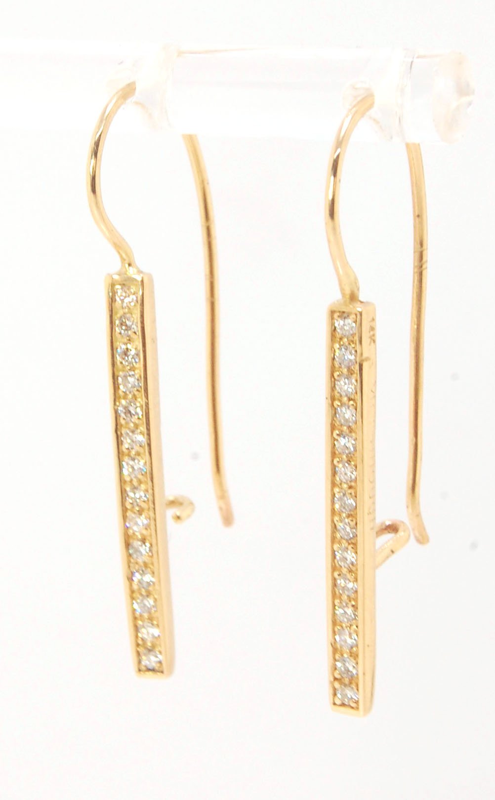 Long Diamond Earrings with french hook and clasp - 14k yellow gold These great little sparklers are subtle enough for every day as long as you don’t mind everyone noticing! They have 14 x 1.3mm colorless diamonds in a single pave row. Earrings have a fren