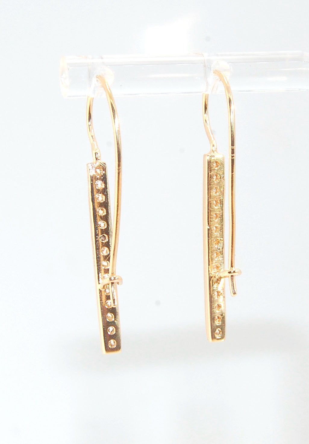 Long Diamond Earrings with french hook and clasp - 14k yellow gold These great little sparklers are subtle enough for every day as long as you don’t mind everyone noticing! They have 14 x 1.3mm colorless diamonds in a single pave row. Earrings have a fren