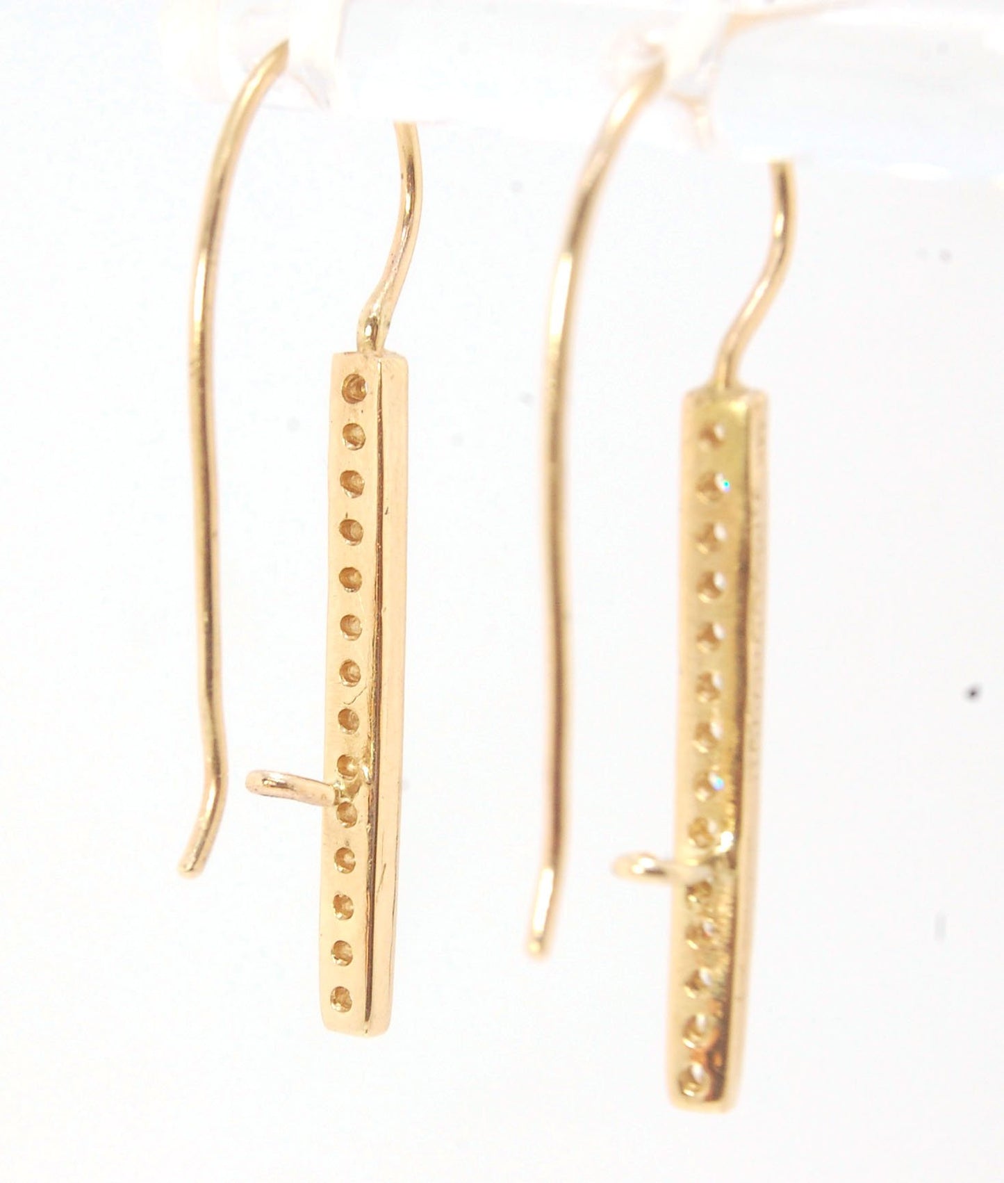 Long Diamond Earrings with french hook and clasp - 14k yellow gold These great little sparklers are subtle enough for every day as long as you don’t mind everyone noticing! They have 14 x 1.3mm colorless diamonds in a single pave row. Earrings have a fren