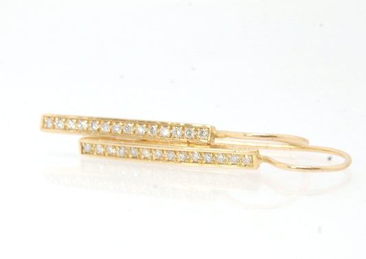 Long Diamond Earrings with french hook and clasp - 14k yellow gold These great little sparklers are subtle enough for every day as long as you don’t mind everyone noticing! They have 14 x 1.3mm colorless diamonds in a single pave row. Earrings have a fren