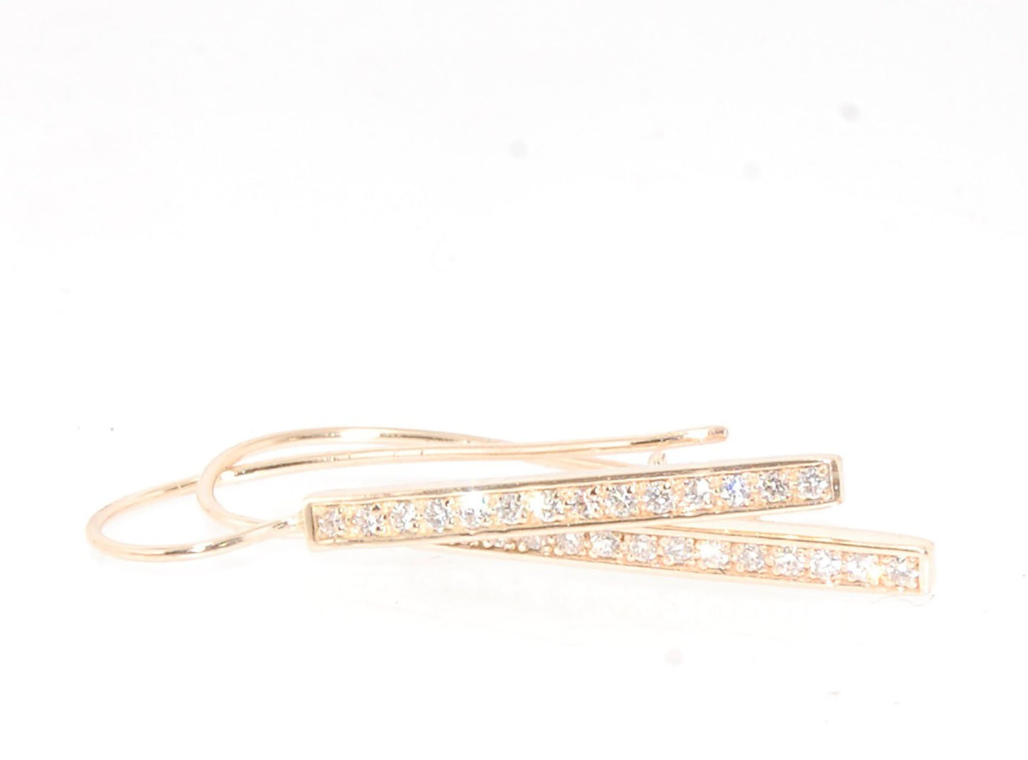 Long Diamond Earrings with french hook and clasp - 14k yellow gold These great little sparklers are subtle enough for every day as long as you don’t mind everyone noticing! They have 14 x 1.3mm colorless diamonds in a single pave row. Earrings have a fren