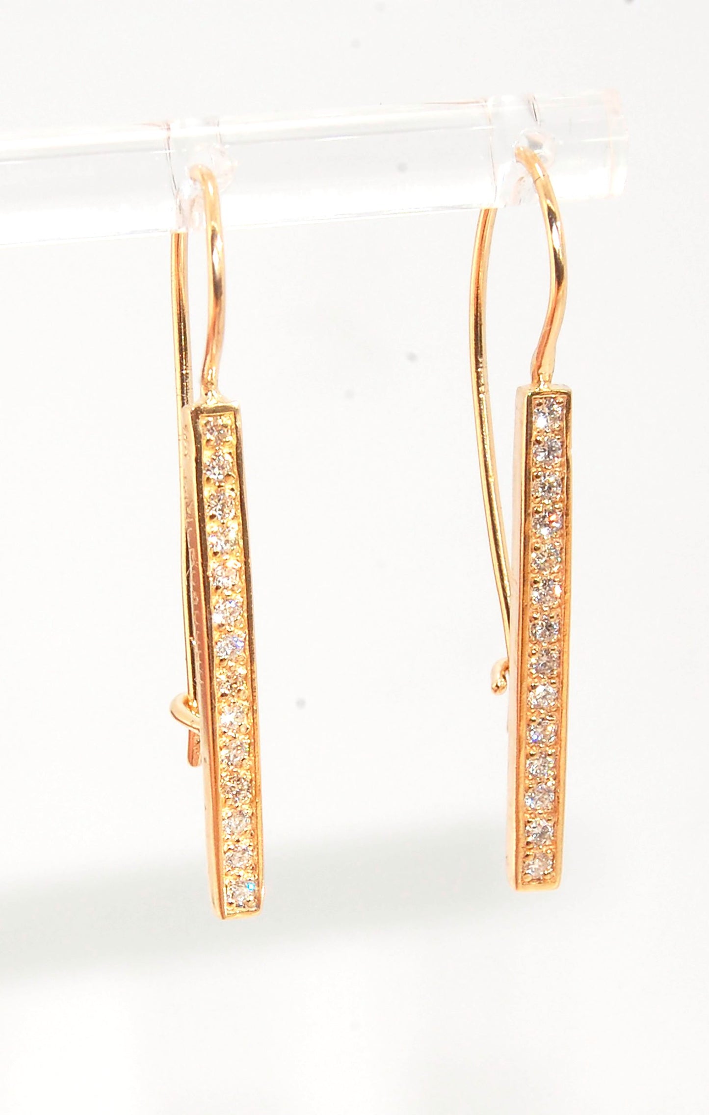 Long Diamond Earrings with french hook and clasp - 14k yellow gold These great little sparklers are subtle enough for every day as long as you don’t mind everyone noticing! They have 14 x 1.3mm colorless diamonds in a single pave row. Earrings have a fren