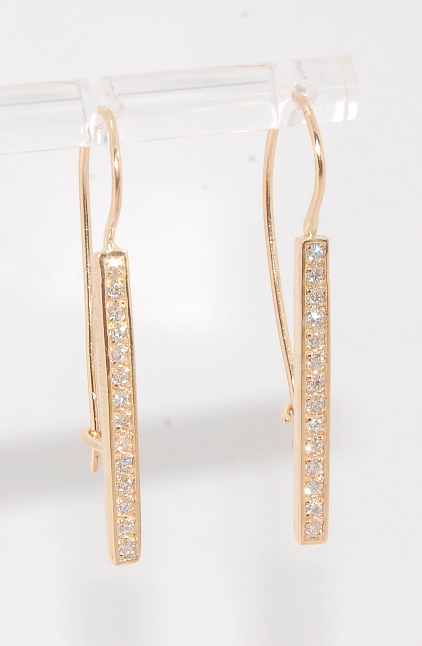 Long Diamond Earrings with french hook and clasp - 14k yellow gold These great little sparklers are subtle enough for every day as long as you don’t mind everyone noticing! They have 14 x 1.3mm colorless diamonds in a single pave row. Earrings have a fren