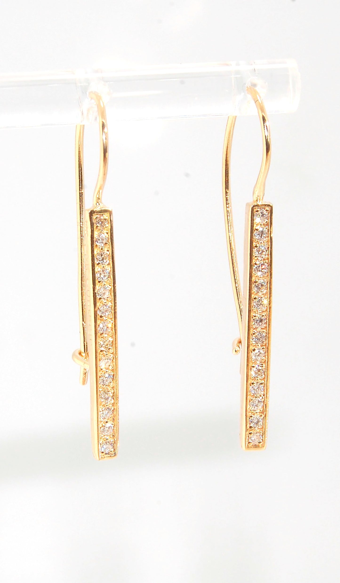 Long Diamond Earrings with french hook and clasp - 14k yellow gold These great little sparklers are subtle enough for every day as long as you don’t mind everyone noticing! They have 14 x 1.3mm colorless diamonds in a single pave row. Earrings have a fren