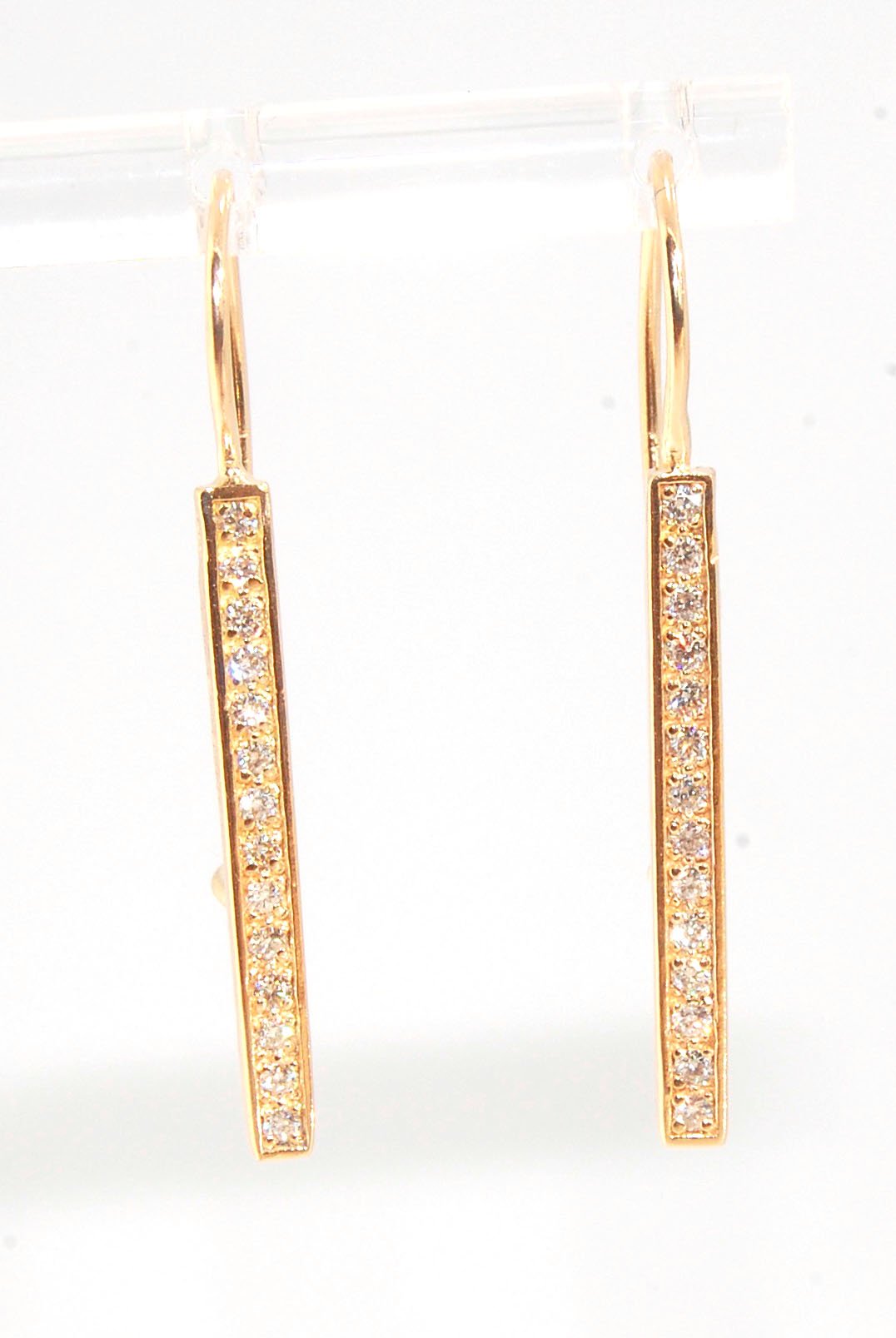 Long Diamond Earrings with french hook and clasp - 14k yellow gold These great little sparklers are subtle enough for every day as long as you don’t mind everyone noticing! They have 14 x 1.3mm colorless diamonds in a single pave row. Earrings have a fren