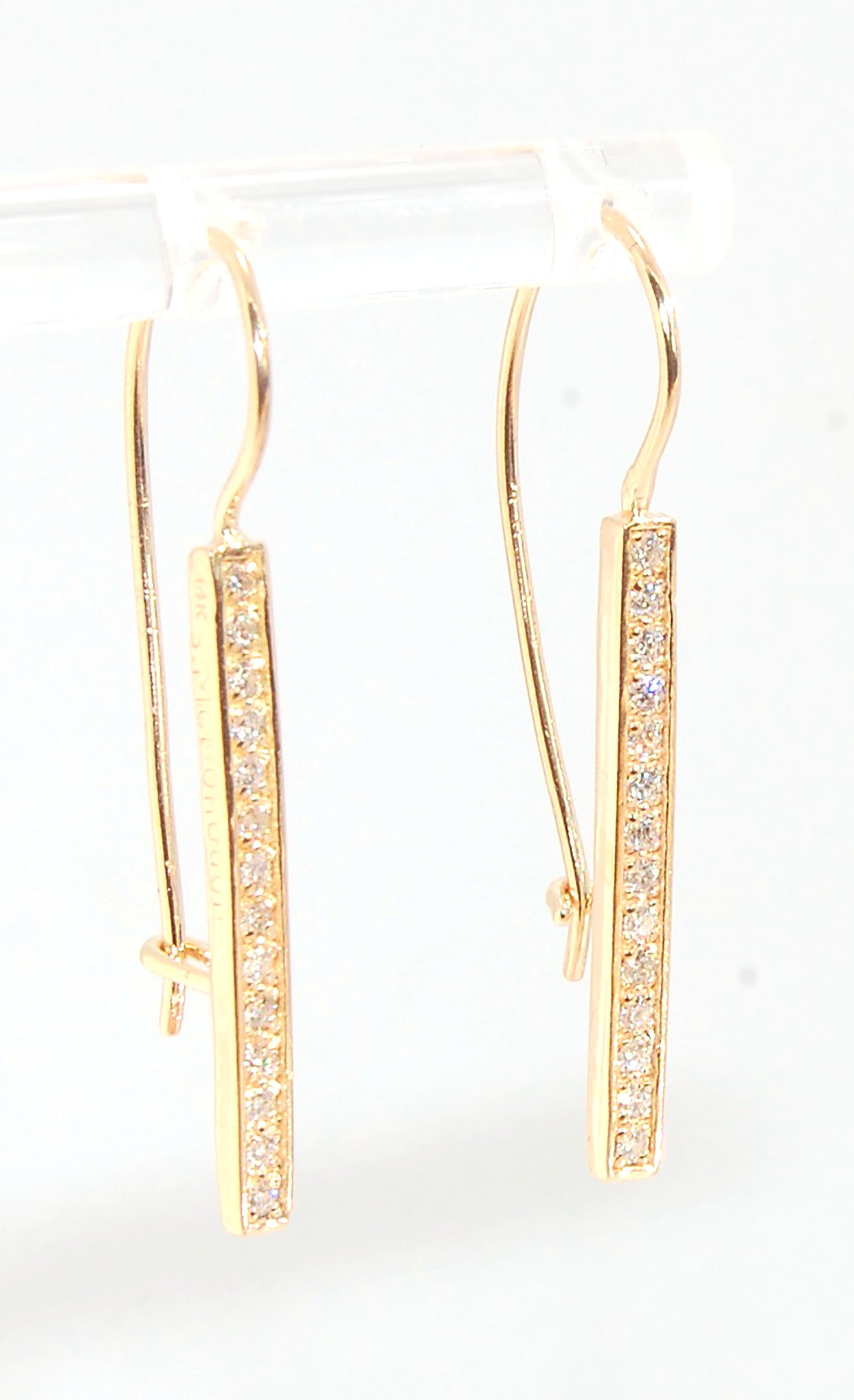 Long Diamond Earrings with french hook and clasp - 14k yellow gold These great little sparklers are subtle enough for every day as long as you don’t mind everyone noticing! They have 14 x 1.3mm colorless diamonds in a single pave row. Earrings have a fren