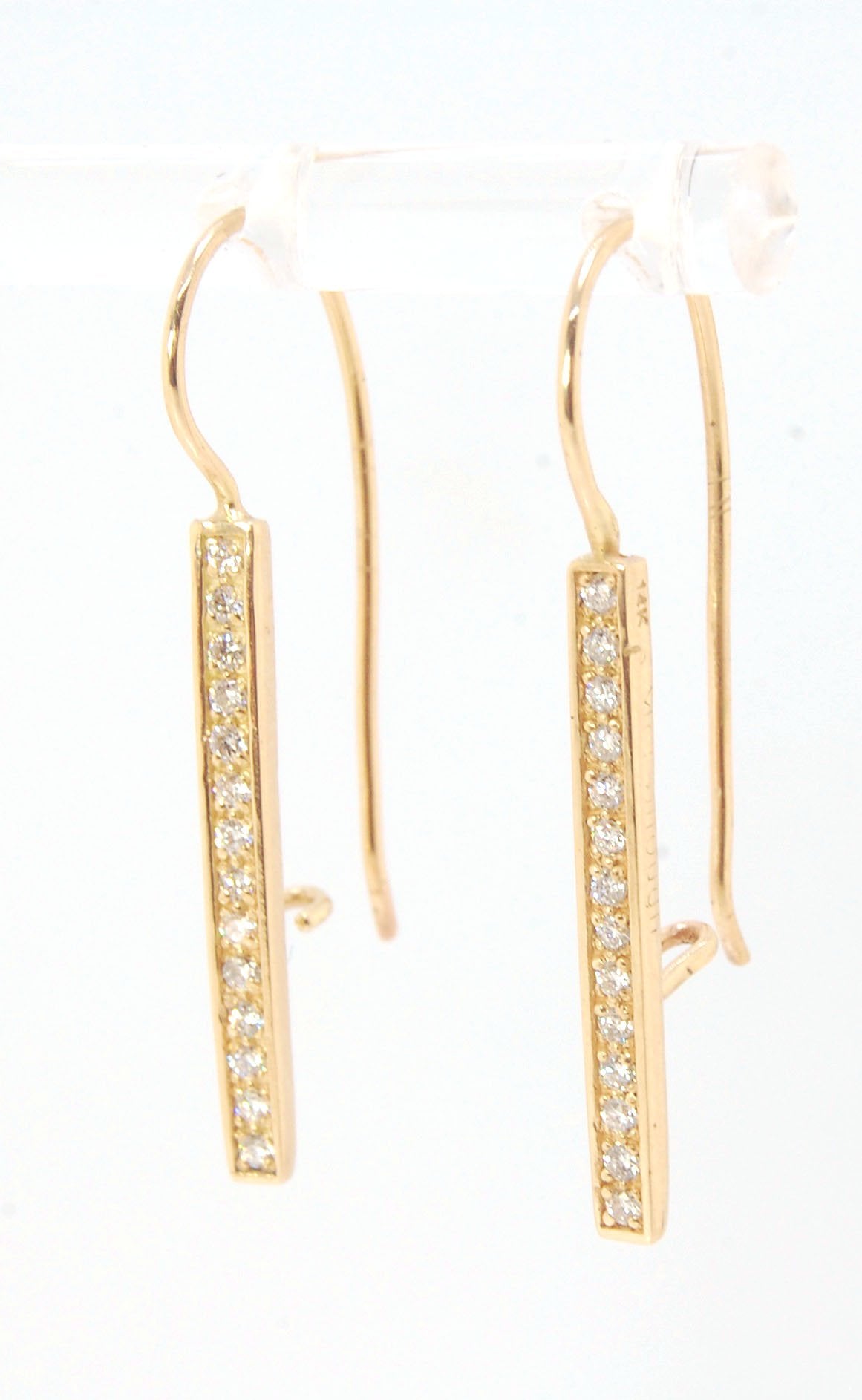 Long Diamond Earrings with french hook and clasp - 14k yellow gold These great little sparklers are subtle enough for every day as long as you don’t mind everyone noticing! They have 14 x 1.3mm colorless diamonds in a single pave row. Earrings have a fren