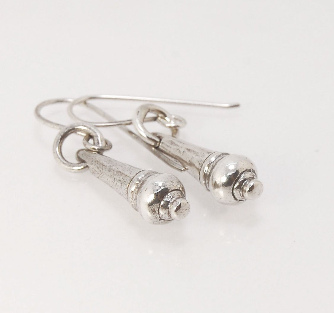 MET Drop Dangles in Sterling A play on an ancient Roman pair of Earrings I saw at the MET, these cast sterling dangle earrings have a great weight and terrific movement! I carved tthe original dangle from wax and then cast it using the Lost Wax process. T