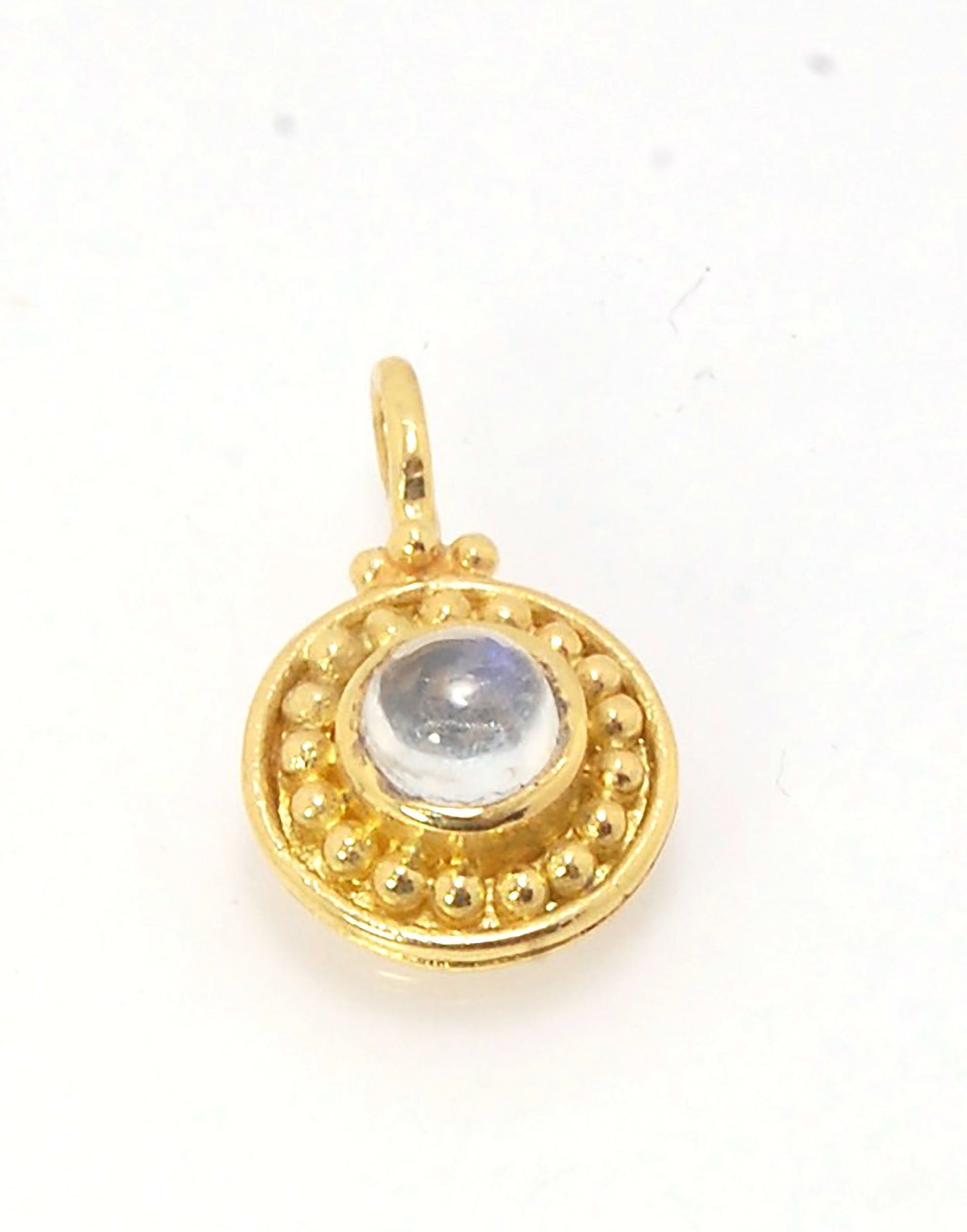 Tiny Round Rainbow Moonstone 18k gold Granulated Pendant This beautiful tiny round rainbow moonstone has so much luminance! A bezel-set small round rainbow moonstone is surrounded by larger 18k gold granules and can be ordered on the your chain of choice.