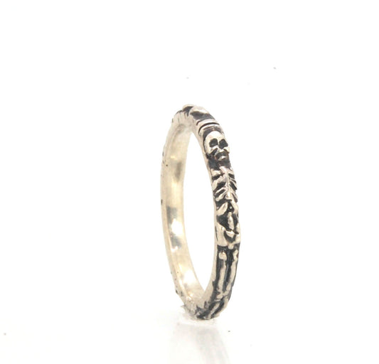 Oxidized Memento Mori Skeleton Ring - 2.7mm - Sterling Silver This is the most narrow of my Memento Mori Skeleton rings at 2.7mm wide! The Skeleton is flanked by crossed bones on one side and intertwined hearts and an hourglass on the other. This is the 4