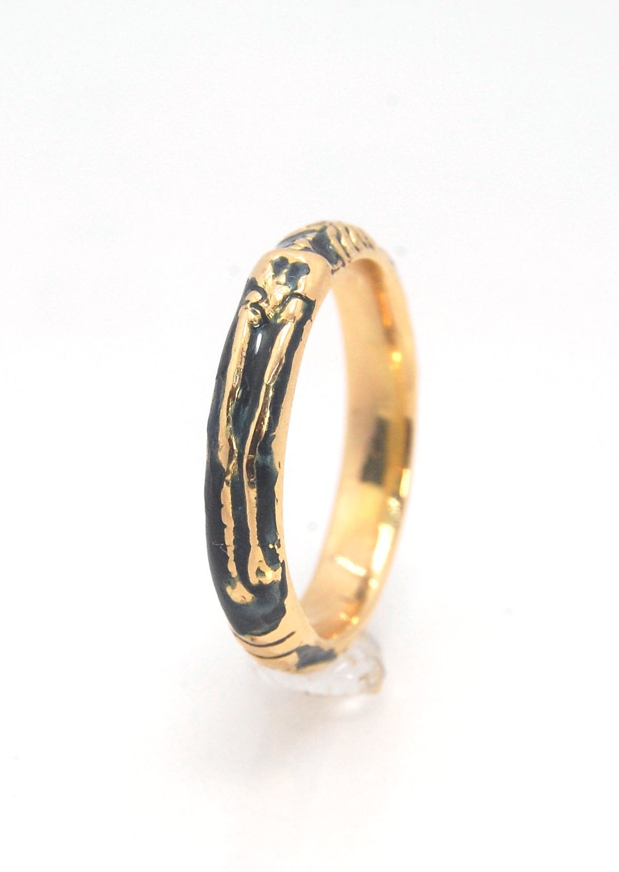 Memento Mori Skeleton Ring in 14k gold with enamel - Medium - 4mm This is the middle width of my Memento Mori skeleton rings at 4mm wide and cast in 14k rich yellow gold. The Skeleton is flanked by crossed bones on one side and an hourglass on the other.1