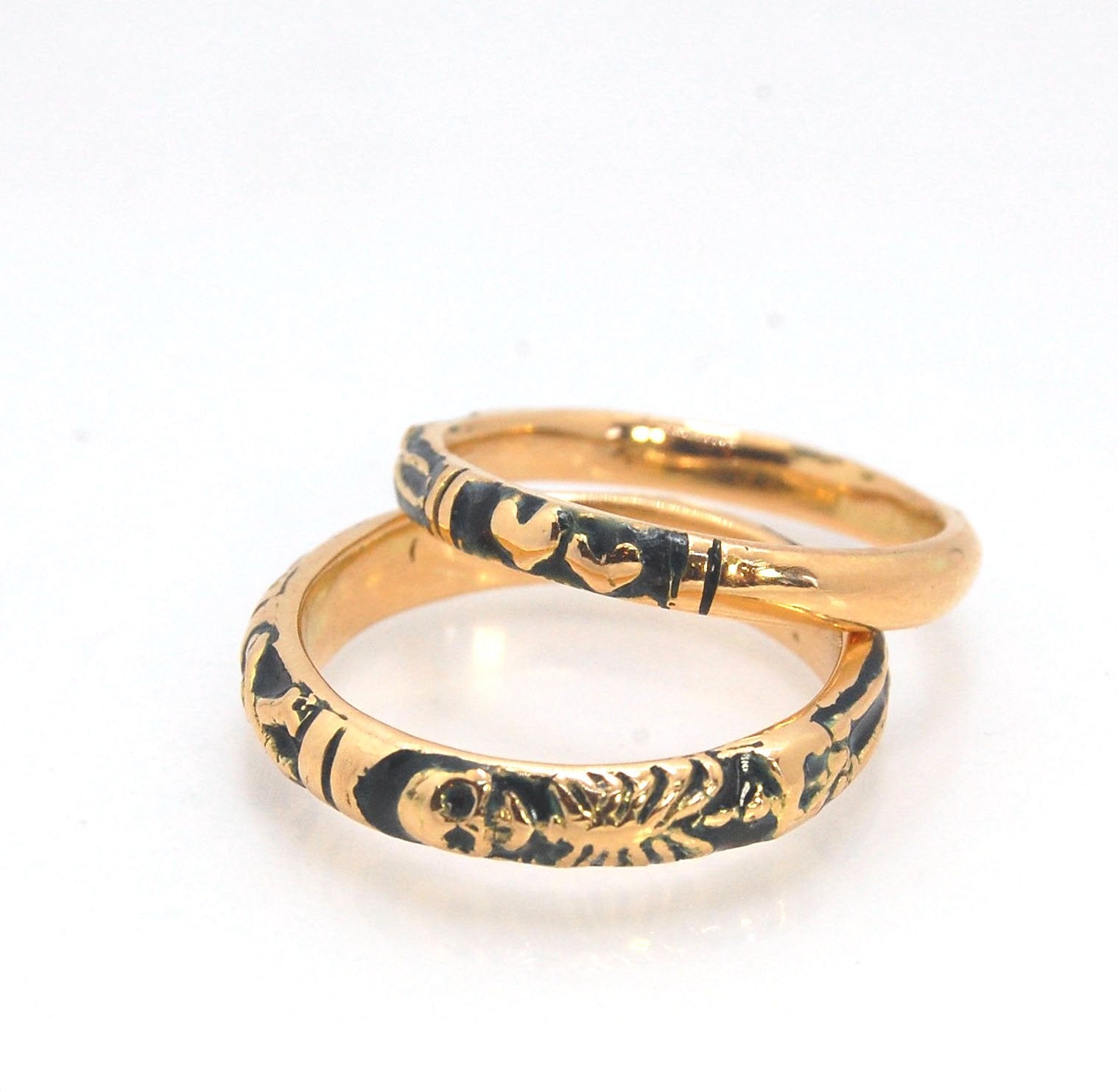 Memento Mori Skeleton Ring in 14k gold - 3mm This is the most narrow of my Memento Mori rings at 3mm wide and is cast in 14k rich yellow gold. The Skeleton is flanked by intertwined hearts on one side.14k rich yellow gold and EnamelMade to Order. Usually