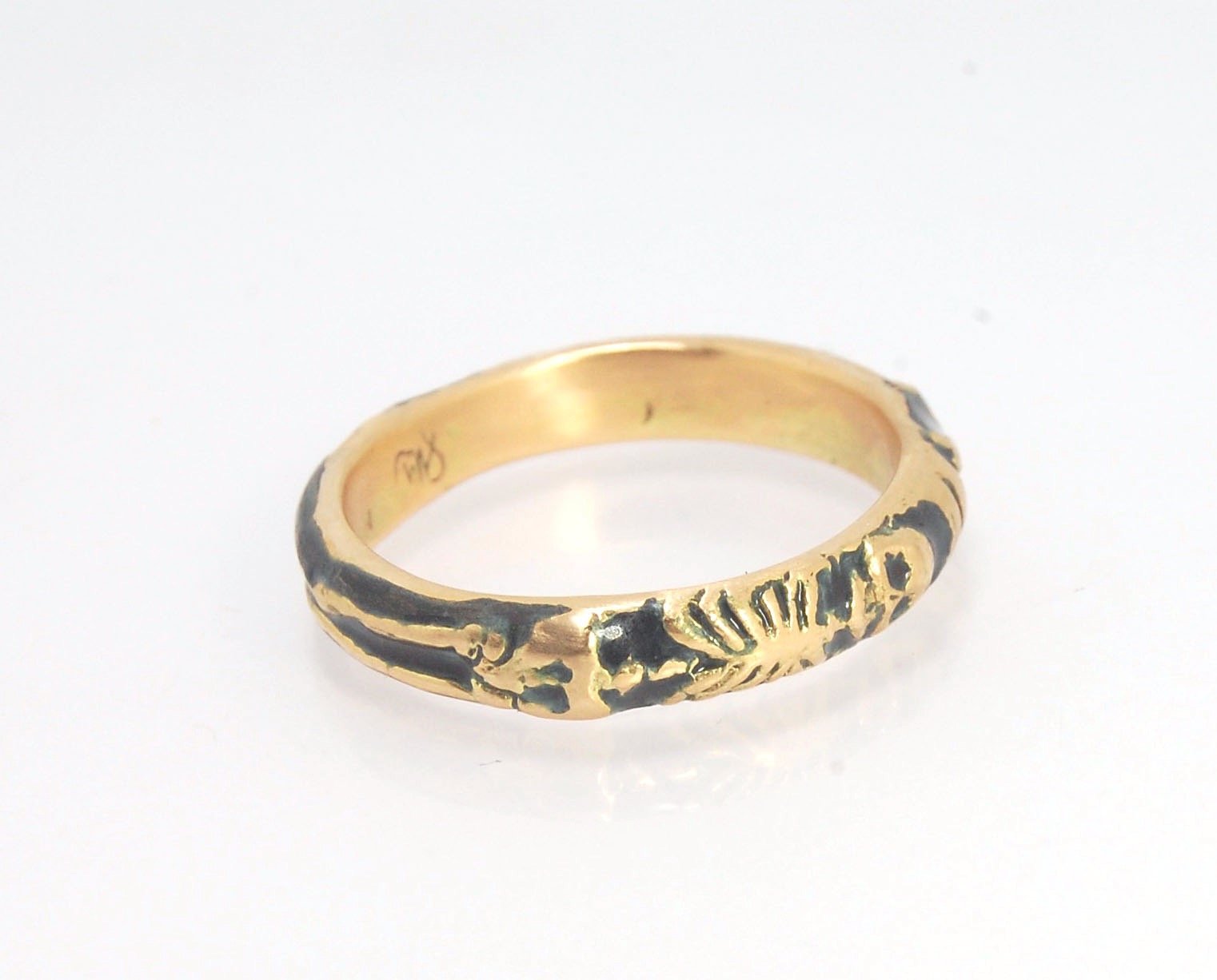 Memento Mori Skeleton Ring in 14k gold with enamel - Medium - 4mm This is the middle width of my Memento Mori skeleton rings at 4mm wide and cast in 14k rich yellow gold. The Skeleton is flanked by crossed bones on one side and an hourglass on the other.1