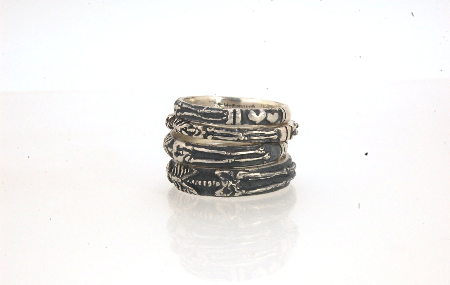 Oxidized Memento Mori Skeleton Ring - Wide 5.5m - Sterling SIlver This is the widest of my Memento Mori rings at 5.5mm wide. The skeleton spans the majority of the band, so I think the smallest I can make this ring without cutting off the design is a size