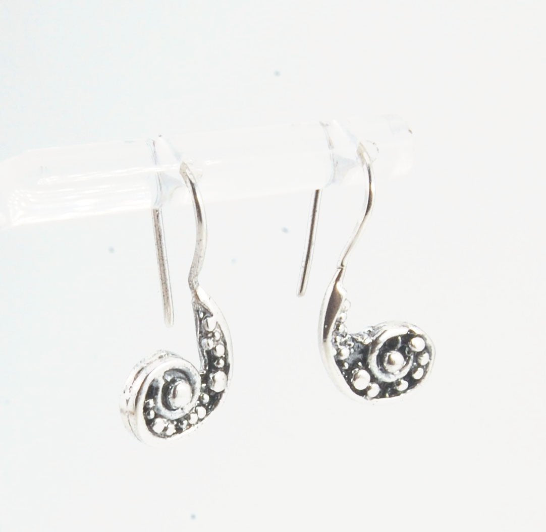 Nautilus Spiral Earrings -Small - Sterling These are cast versions of original granulation work, which is then molded for repeat waxes and then cast in my studio. (Actually outside on the porch because it is a smelly process!) These have a french wire and