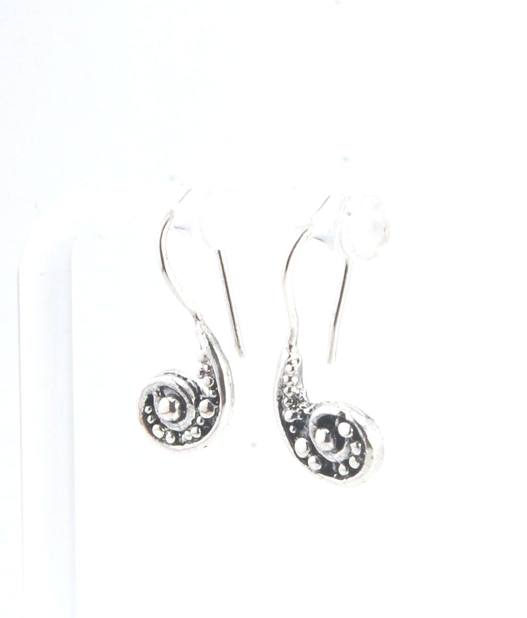 Nautilus Spiral Earrings -Small - Sterling These are cast versions of original granulation work, which is then molded for repeat waxes and then cast in my studio. (Actually outside on the porch because it is a smelly process!) These have a french wire and