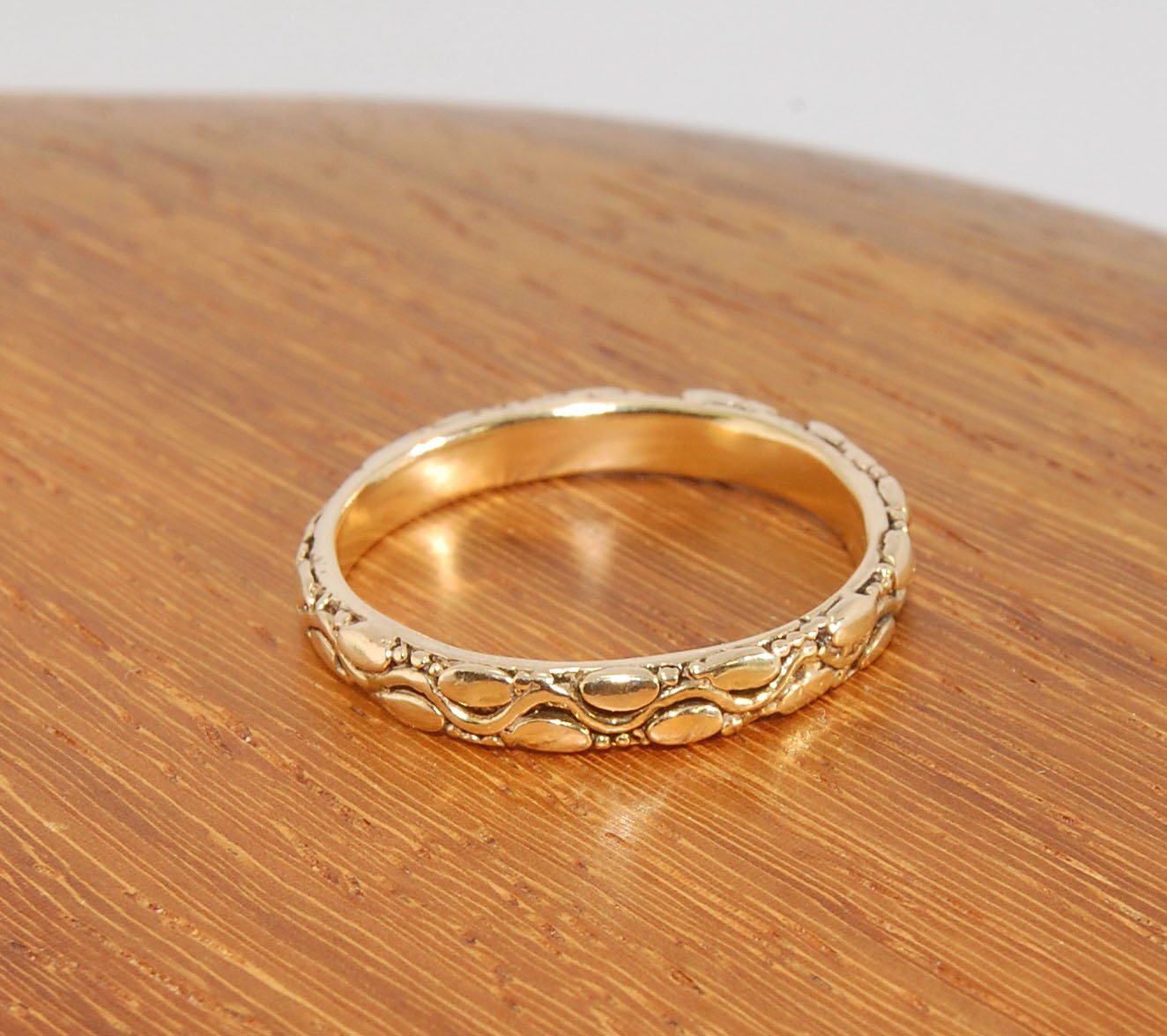 Ovals Pattern Band -3mm- Order in any size -14k, 18k, FS or Sterling This is a 3mm patterned band with small oval and small granules around a wavy center line. This is a cast version of a striking and fun band I originally made in fine silver using the pr