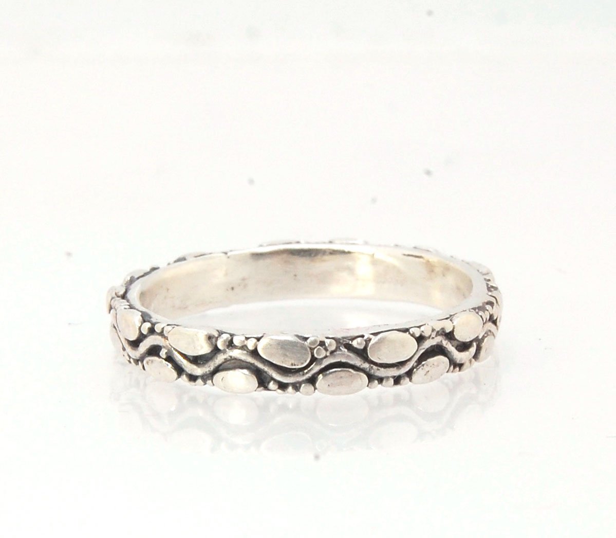 Ovals Pattern Band -3mm- Order in any size -14k, 18k, FS or Sterling This is a 3mm patterned band with small oval and small granules around a wavy center line. This is a cast version of a striking and fun band I originally made in fine silver using the pr