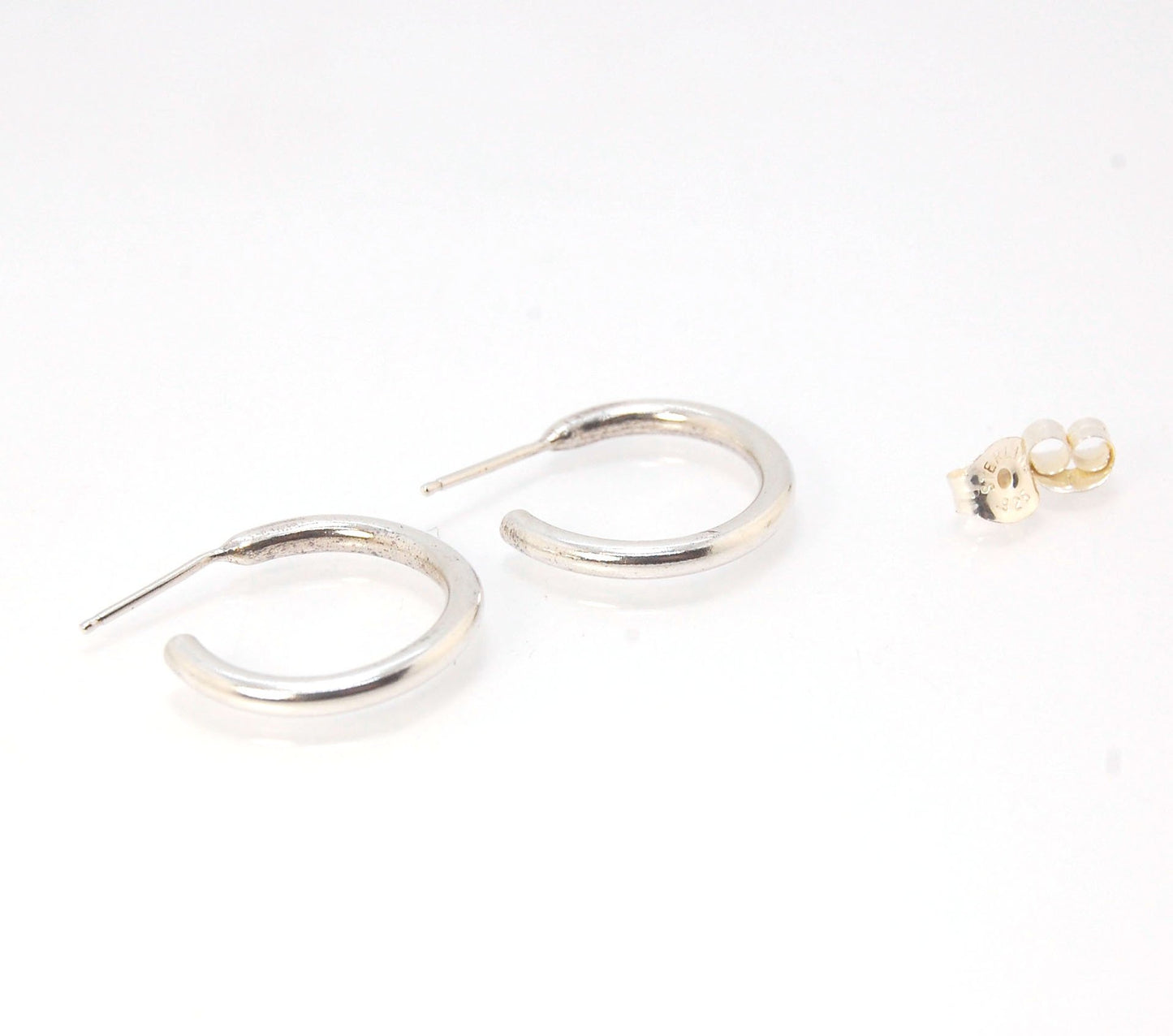 Solid Hoop Post Earrings - Medium - in Sterling These are a nice 3/4“ or 17mm wide post earrings. Made with a solid round rod of sterling silver and some solder posts, these simple and classy sterling silver posts have a nice light weight. Finished with a