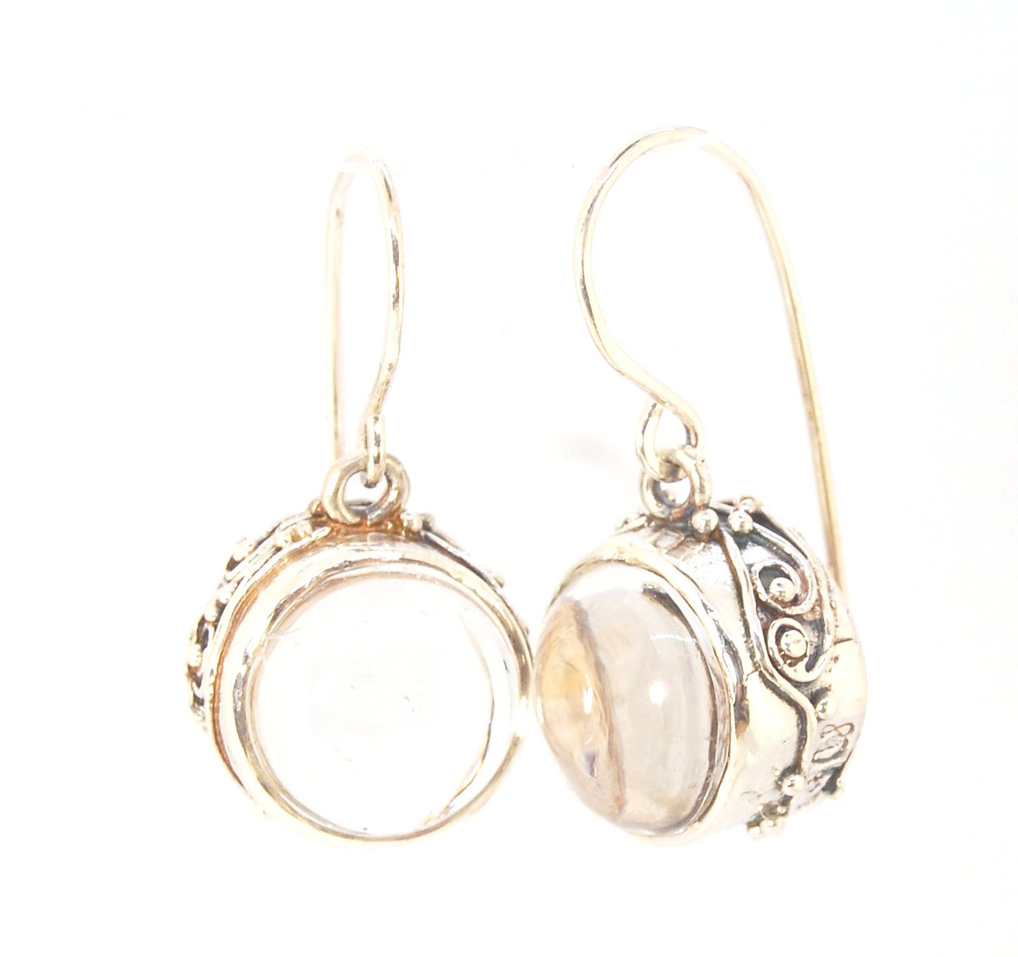 Clear Quartz Swirled Earrings with French Hook in Sterling - Large - 15mm These are cast in my studio using the ancient technique of lost wax casting with a wax model molded from an original granulated piece of fine silver.These clear quartz cabochon earr