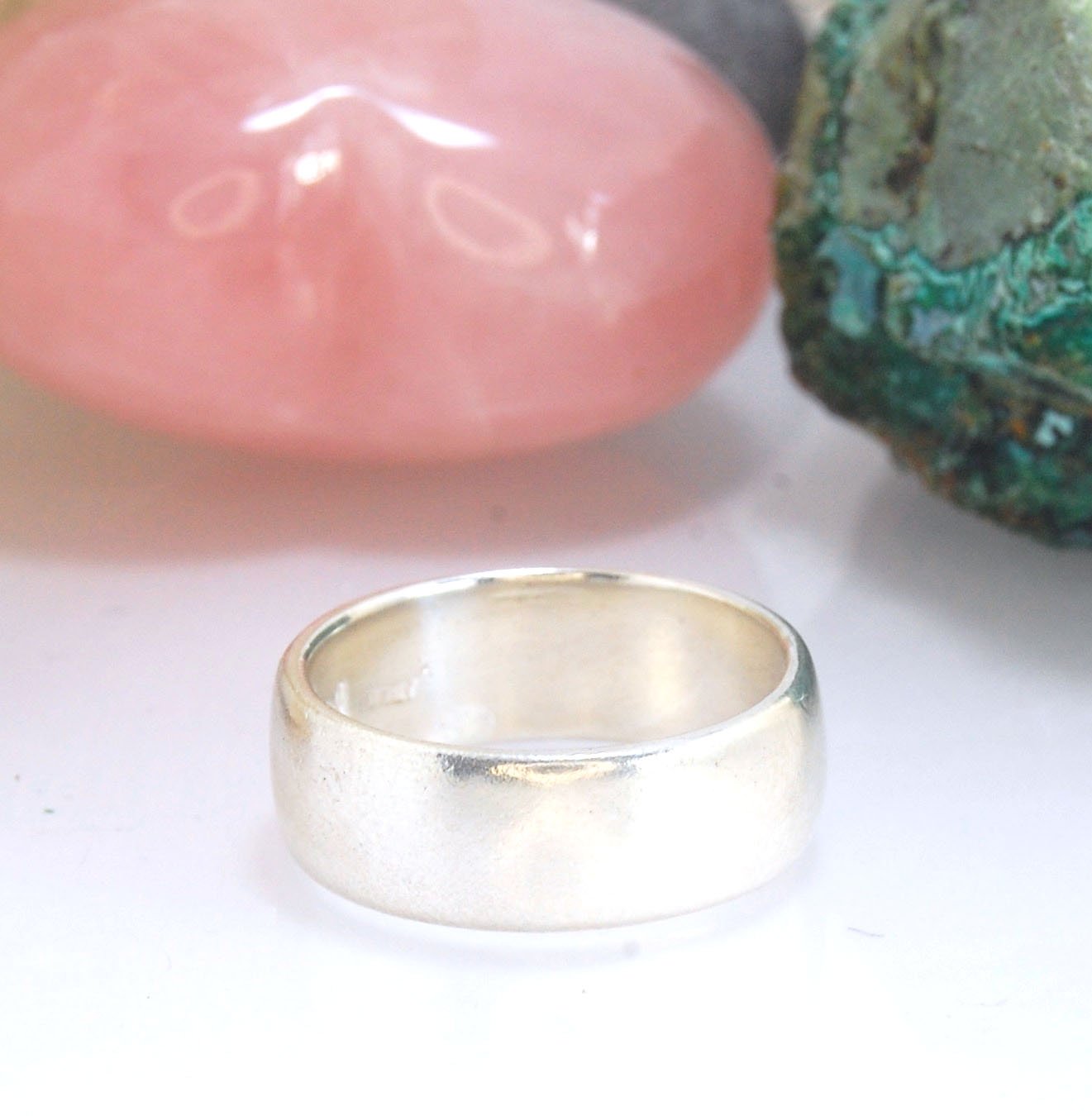 Real Wide Flat Half Round Band Ring in Sterling Silver This is a Real Wide Flat Half Round Band Ring cast from a wax carving. 8mm wide and 2.5mm thick, this ring was turned on a lathe in wax and cast using the lost wax process. These are so much fun to ma