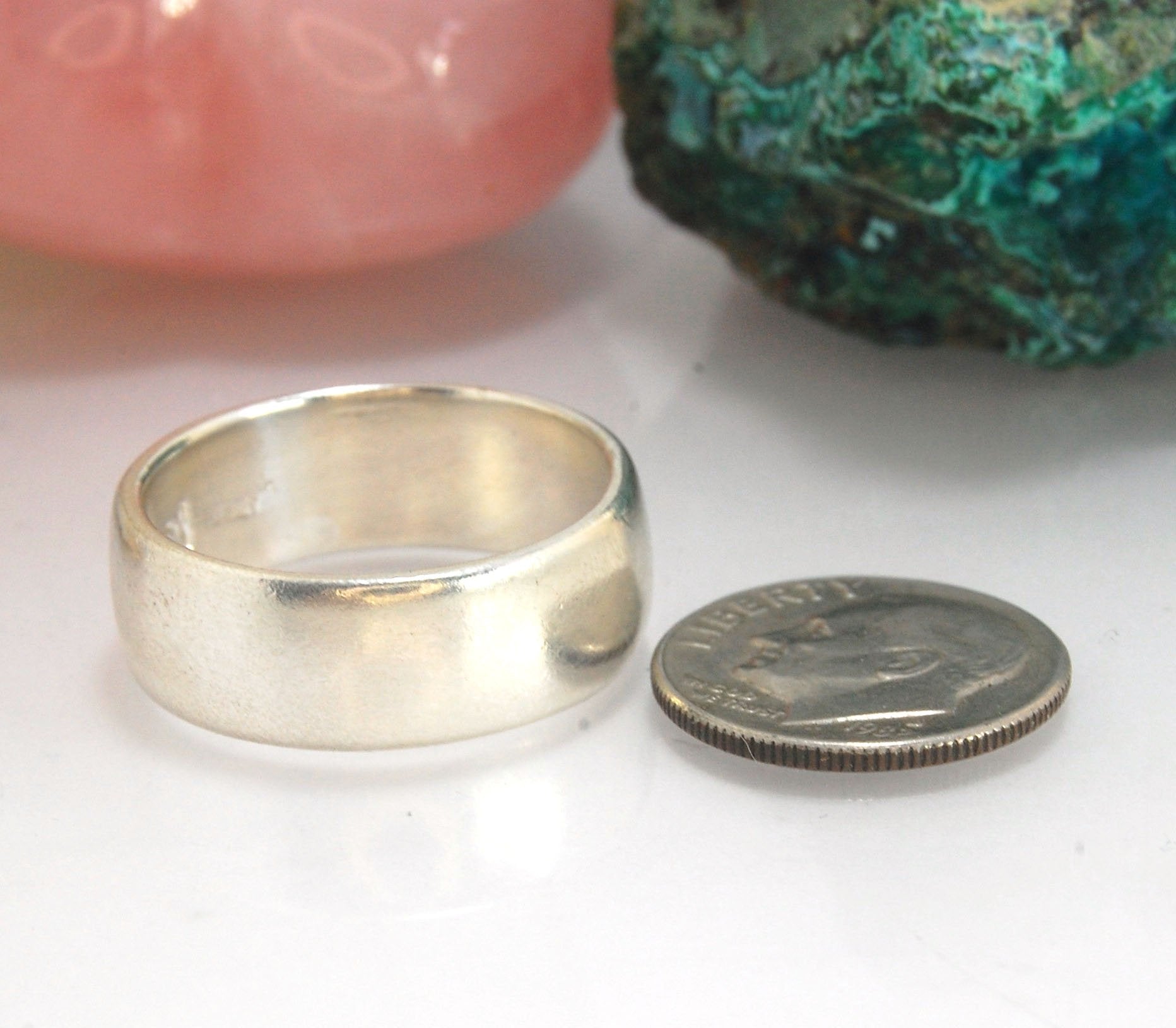 Real Wide Flat Half Round Band Ring in Sterling Silver This is a Real Wide Flat Half Round Band Ring cast from a wax carving. 8mm wide and 2.5mm thick, this ring was turned on a lathe in wax and cast using the lost wax process. These are so much fun to ma