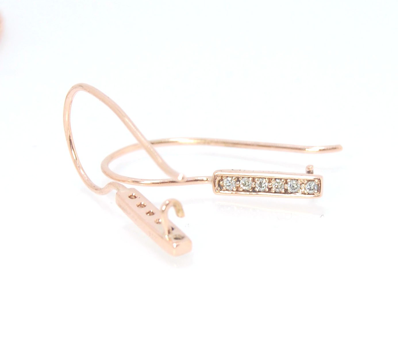 Short Tiny Diamond Earrings with french Hook and clasp - 14k Rose Gold These great little sparklers are subtle enough for every day as long as you don’t mind everyone noticing! They have 6 x 1.3mm diamonds in a single pave row. Earrings have french hook a